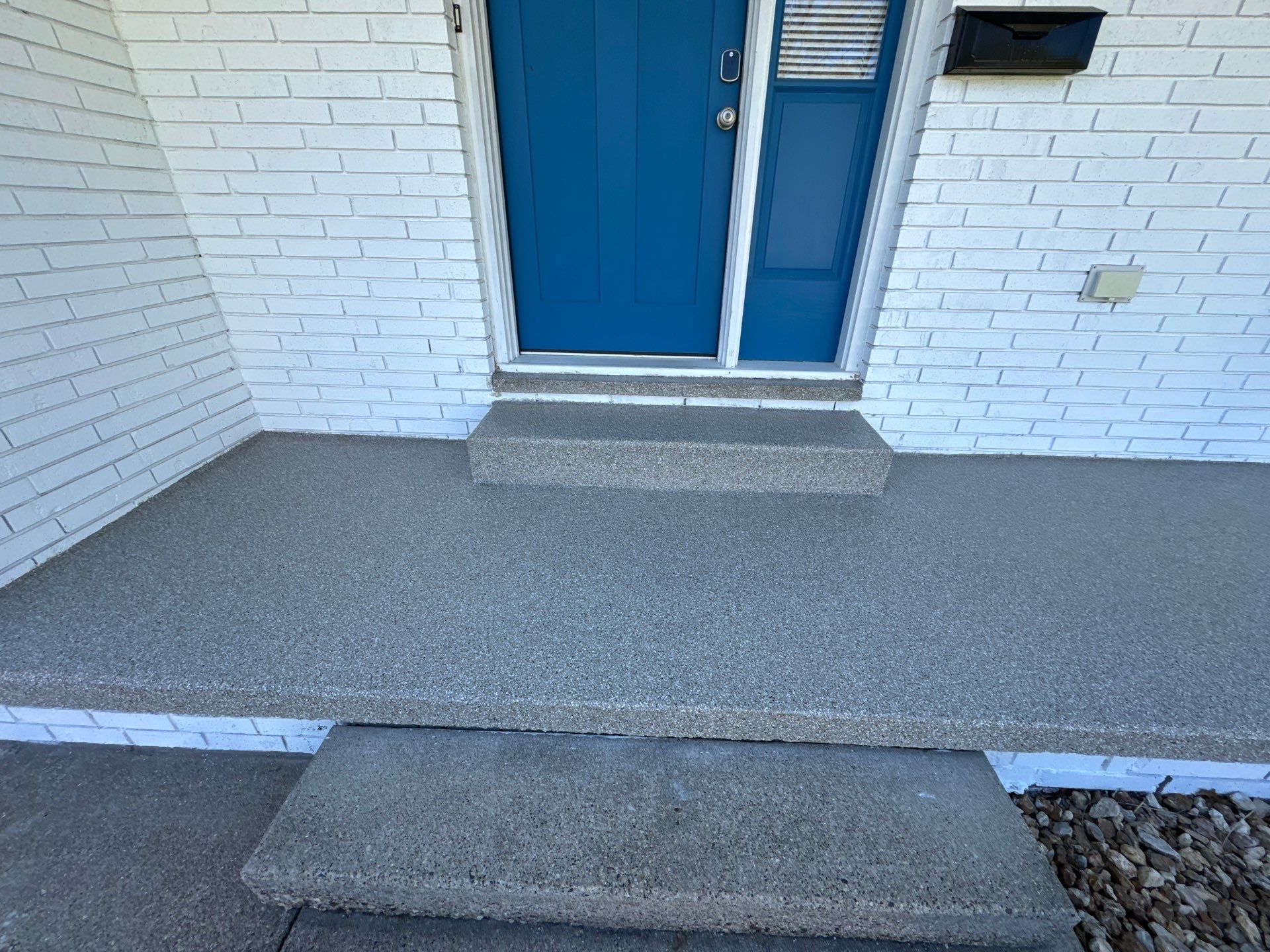 Garage and patio epoxy floor by Gordon Painting