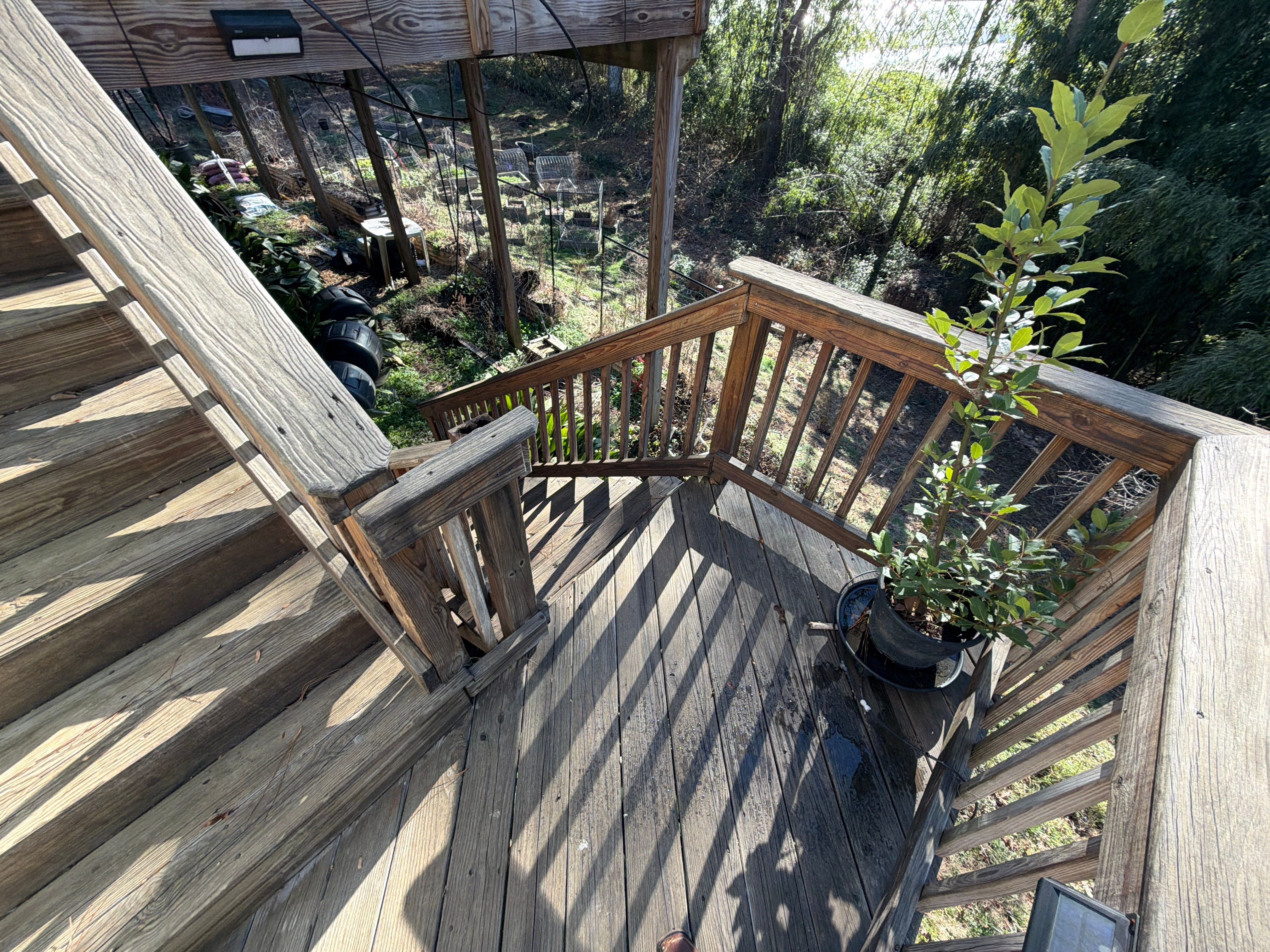 Covered Porch and Deck Build using Deckorators Venture Series Decking and Trex Select Aluminum Railing by Nelson Exteriors