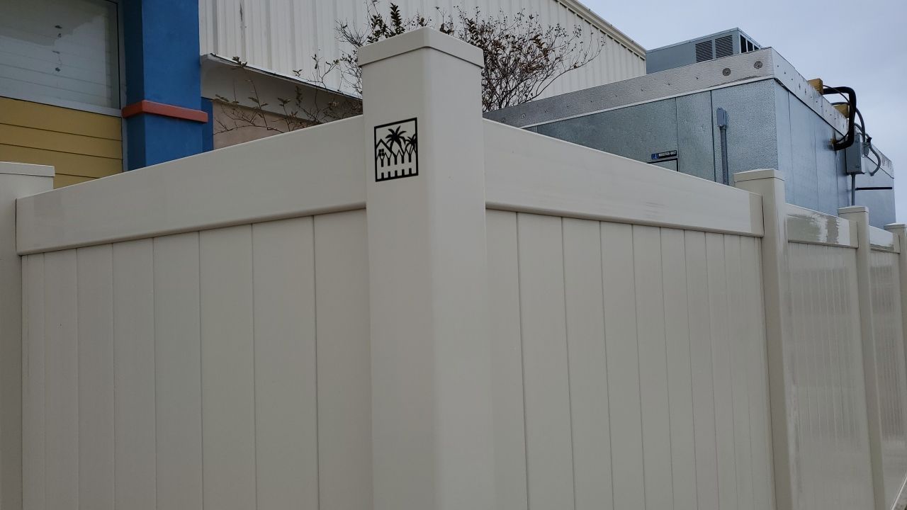 Commercial using Tan 6' Vinyl by Hip Square Fence Inc.