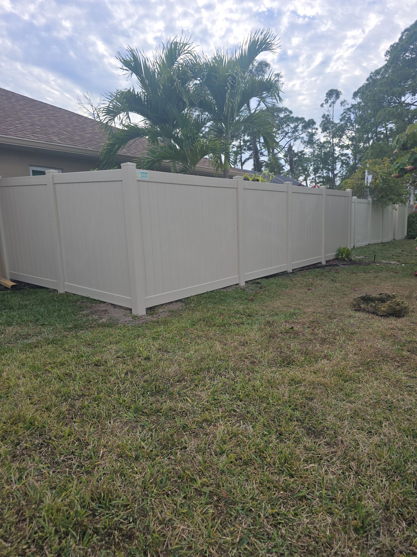 Tan Vinyl Fence in North Port by True Fence LLC