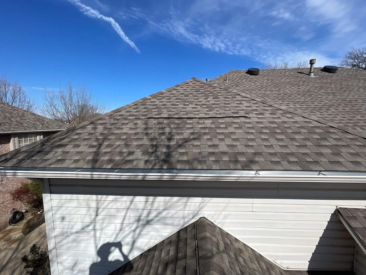 Major storm damage required full roof replacement along with other exterior repairs by First United Roofing & Construction