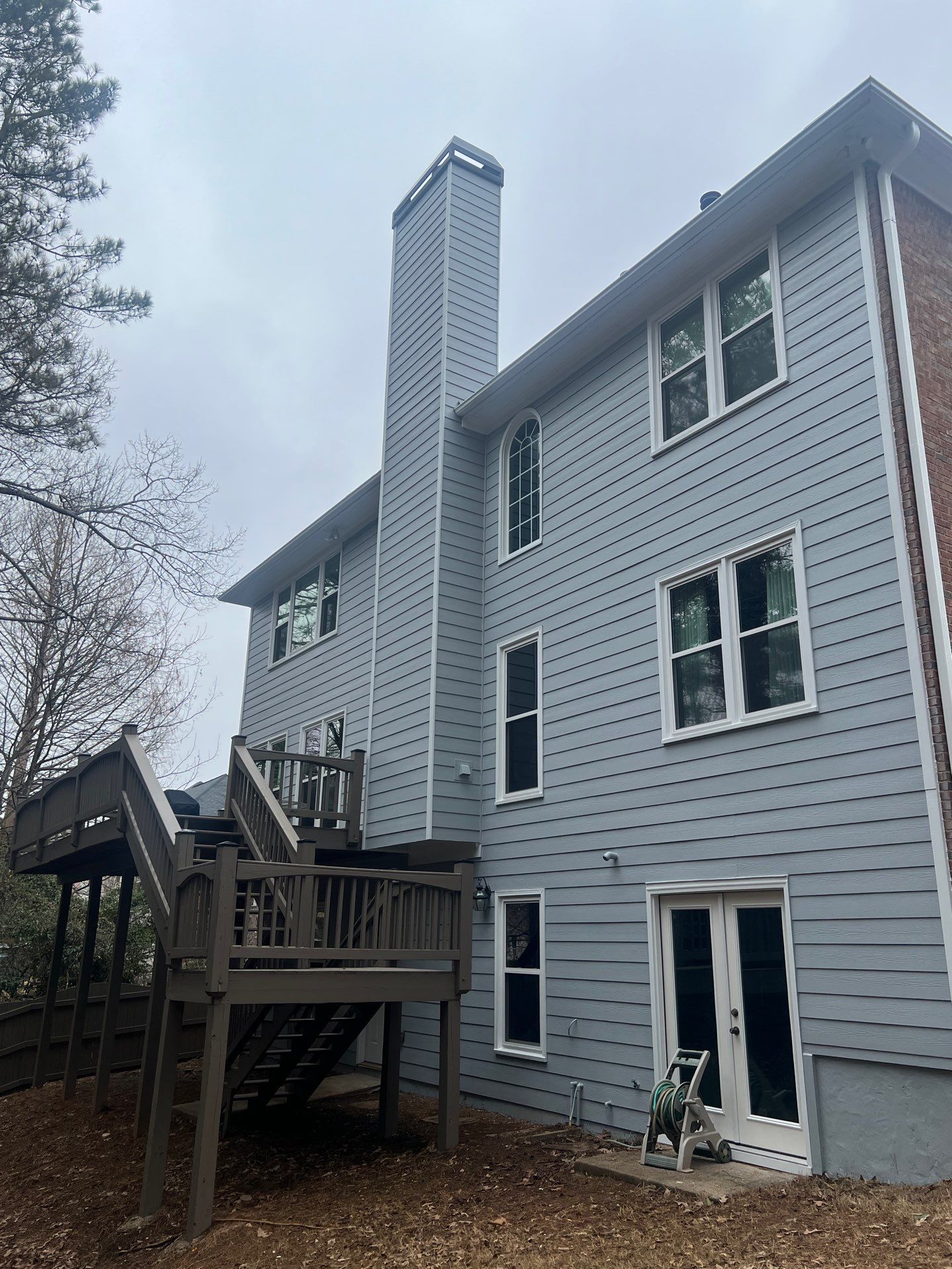Chimney Siding Reconstruction and Full Exterior Painting in Marietta by Swift Home Renovations