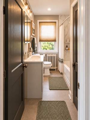 Modern Bathroom Remodel with Marble-Look Tub Surround