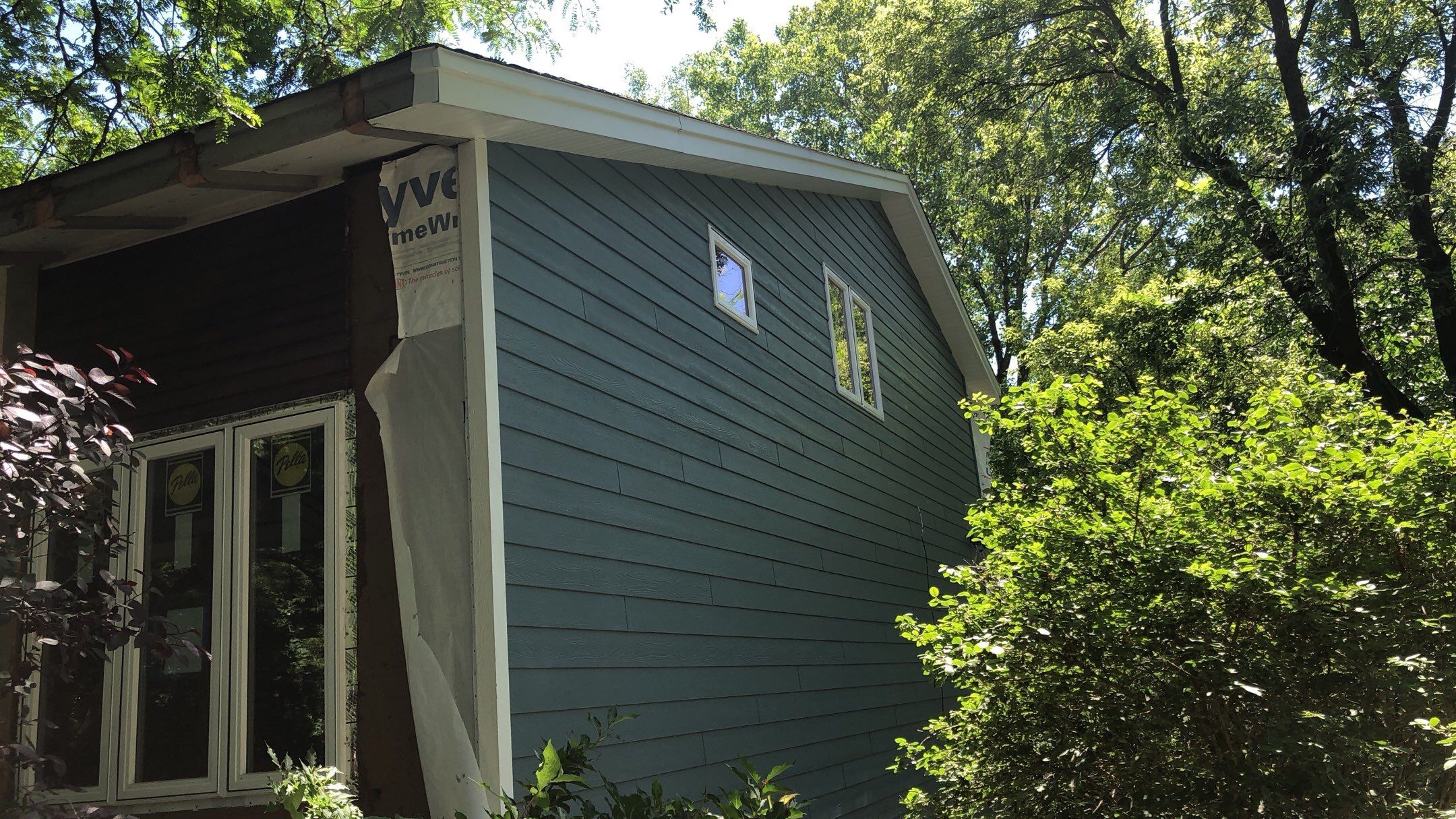 Siding Installation using LP SmartSide and Pella Vinyl Windows by MODERN EXTERIOR SYSTEMS