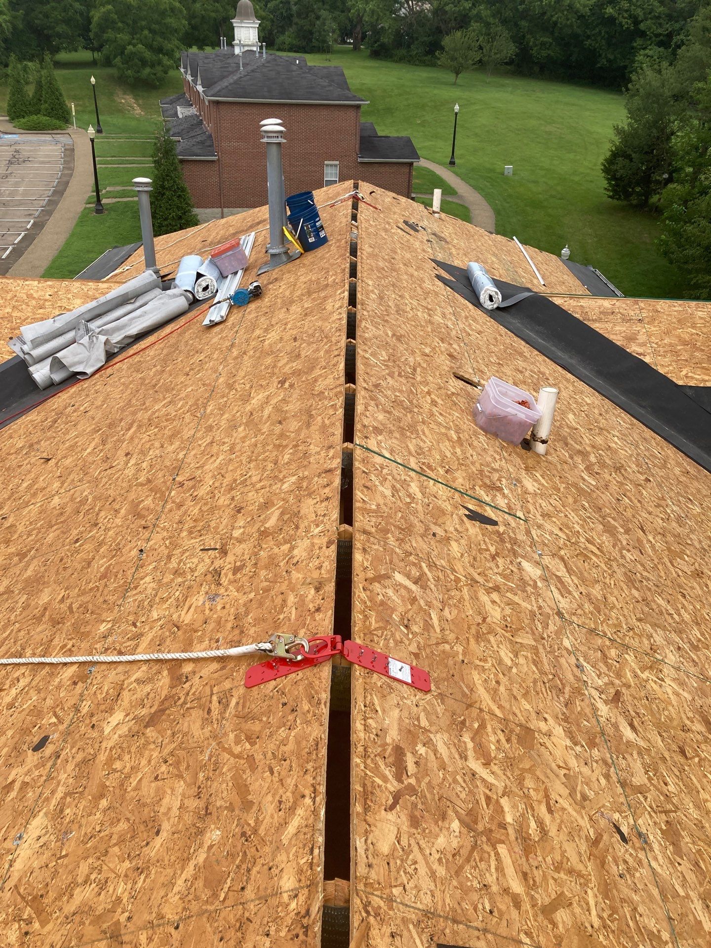 Commercial Roofing Installation using GAF Timberline HDZ Charcoal by Rainstoppers Roofing