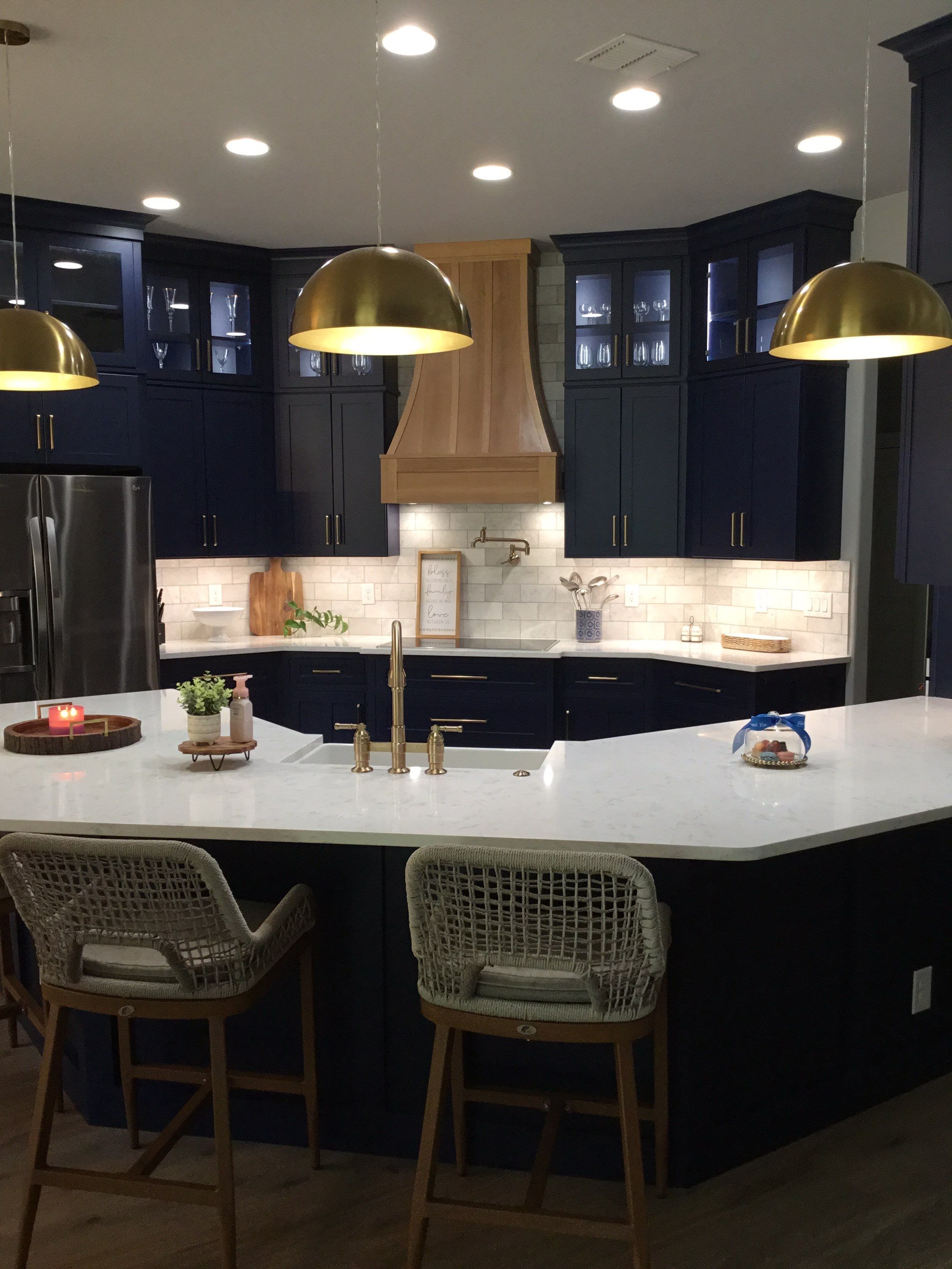Spring Branch Kitchen Remodel | Custom Navy Cabinetry & Wood Range Hood by Legacy Bath and Kitchen