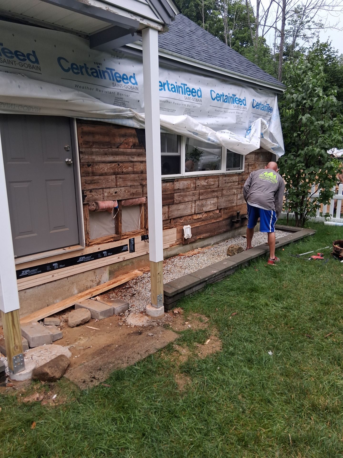 Complete Exterior Renovation Featuring Owens Corning Shingles and Vinyl Siding by Tall pine roofing