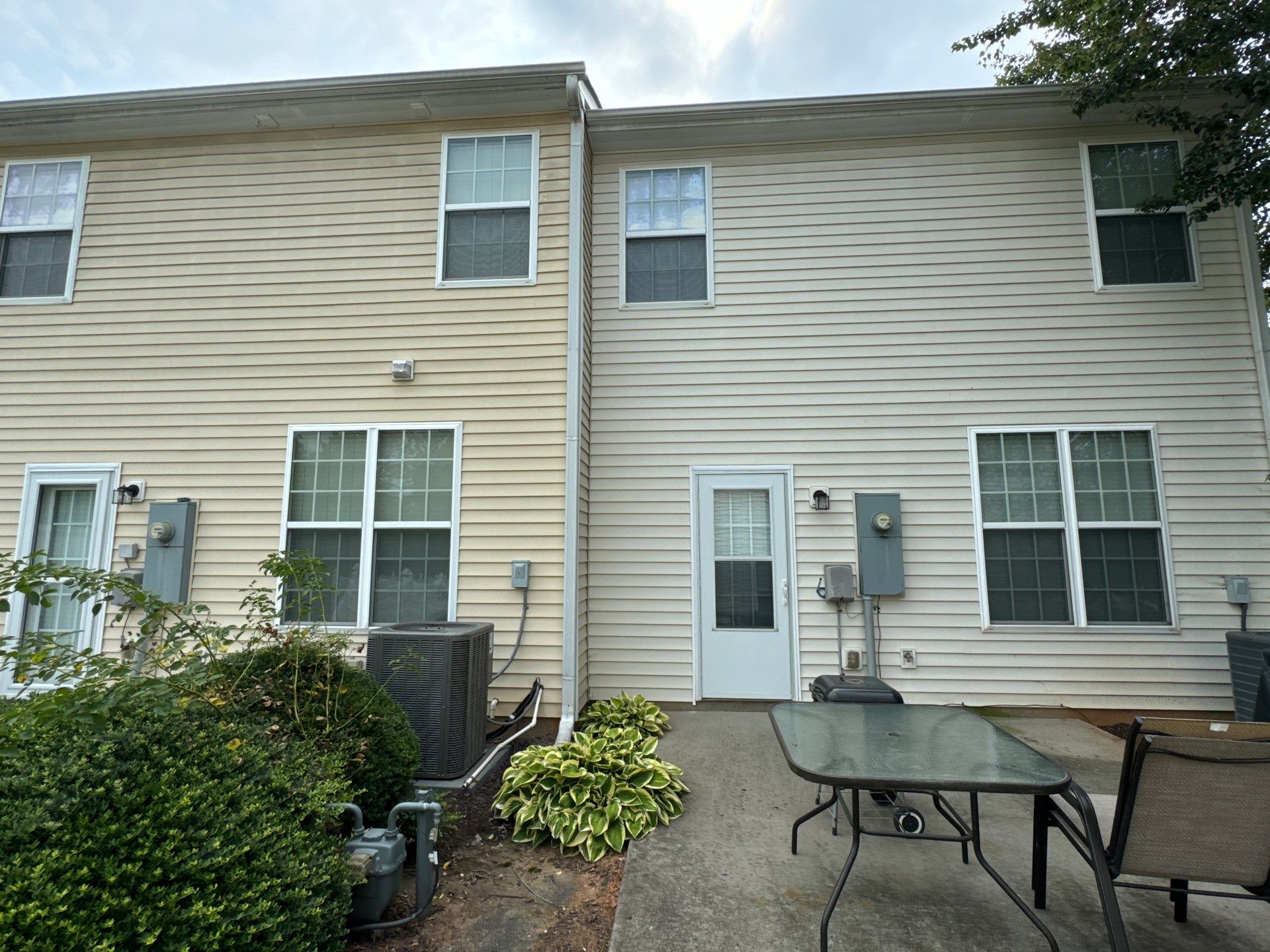 pressure washing exterior siding clean dirt and grime from house surface