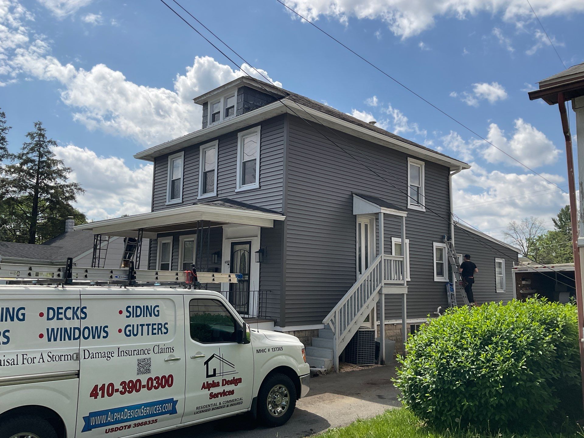 New siding & New Gutters by Alpha Design Services