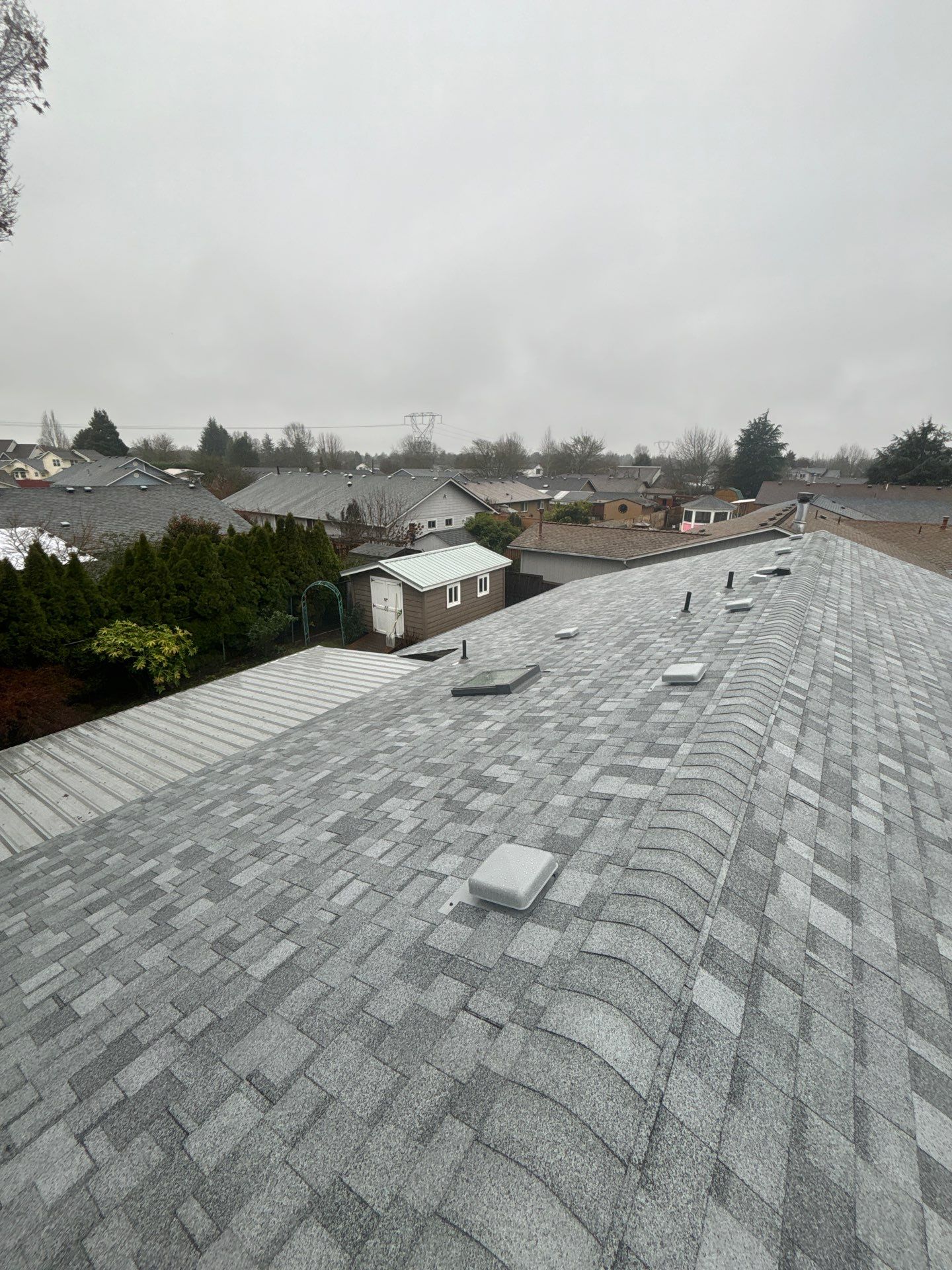 Residential Roofing Installation using IKO Dynasty (Color: Frostone Grey) by Orezona Building & Roofing Company, Inc.