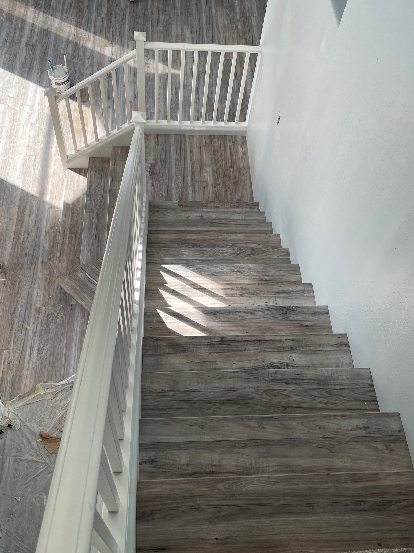 Laminate Staircase and Flooring  by Footprints Floors of Chandler 