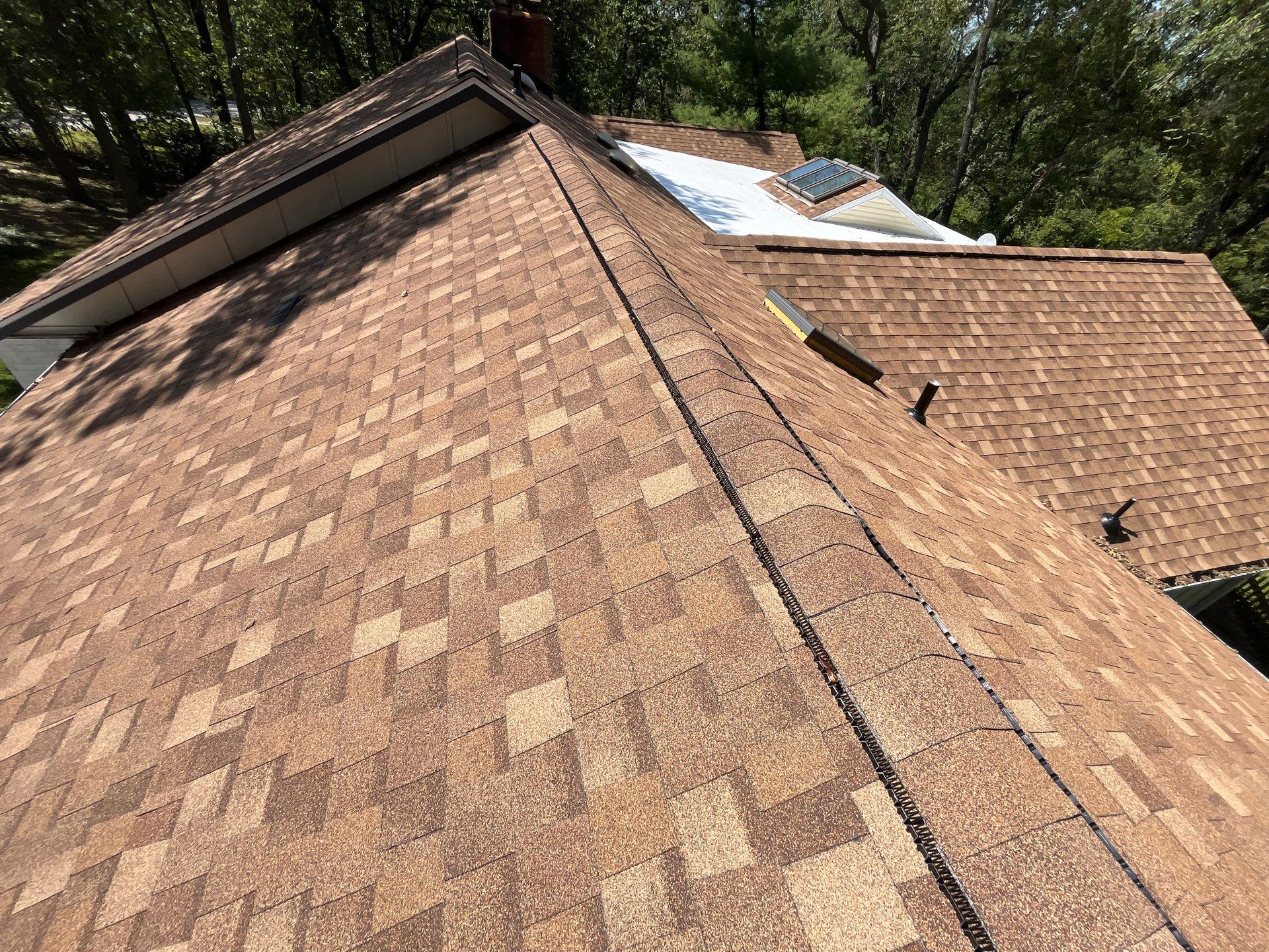Residential Shingle & Flat Roof Installation by Titan Commercial & Residential Roofing 