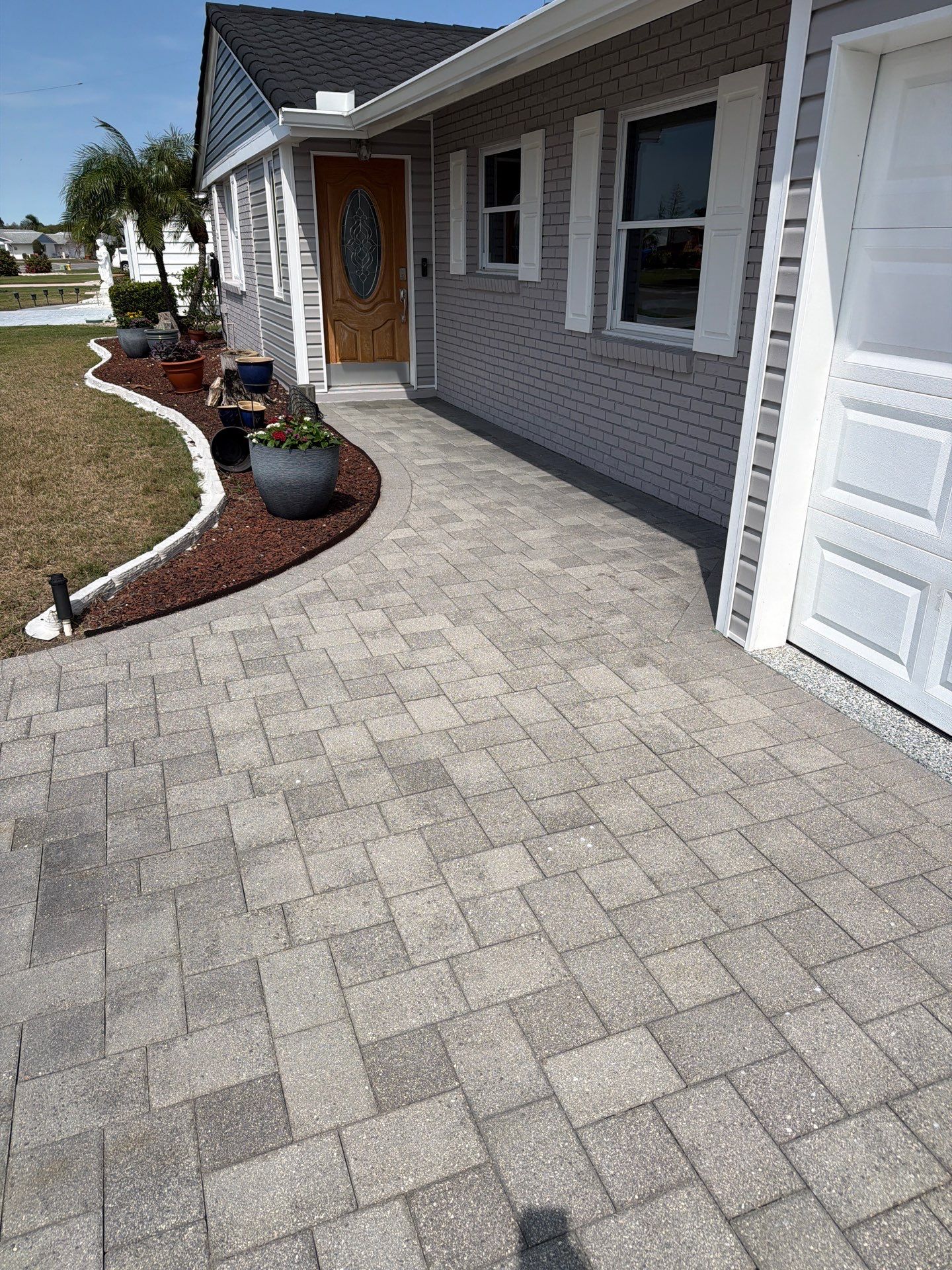 Paver Sealing and Restoration for Sun City Center Driveway by Supreme Paver Experts
