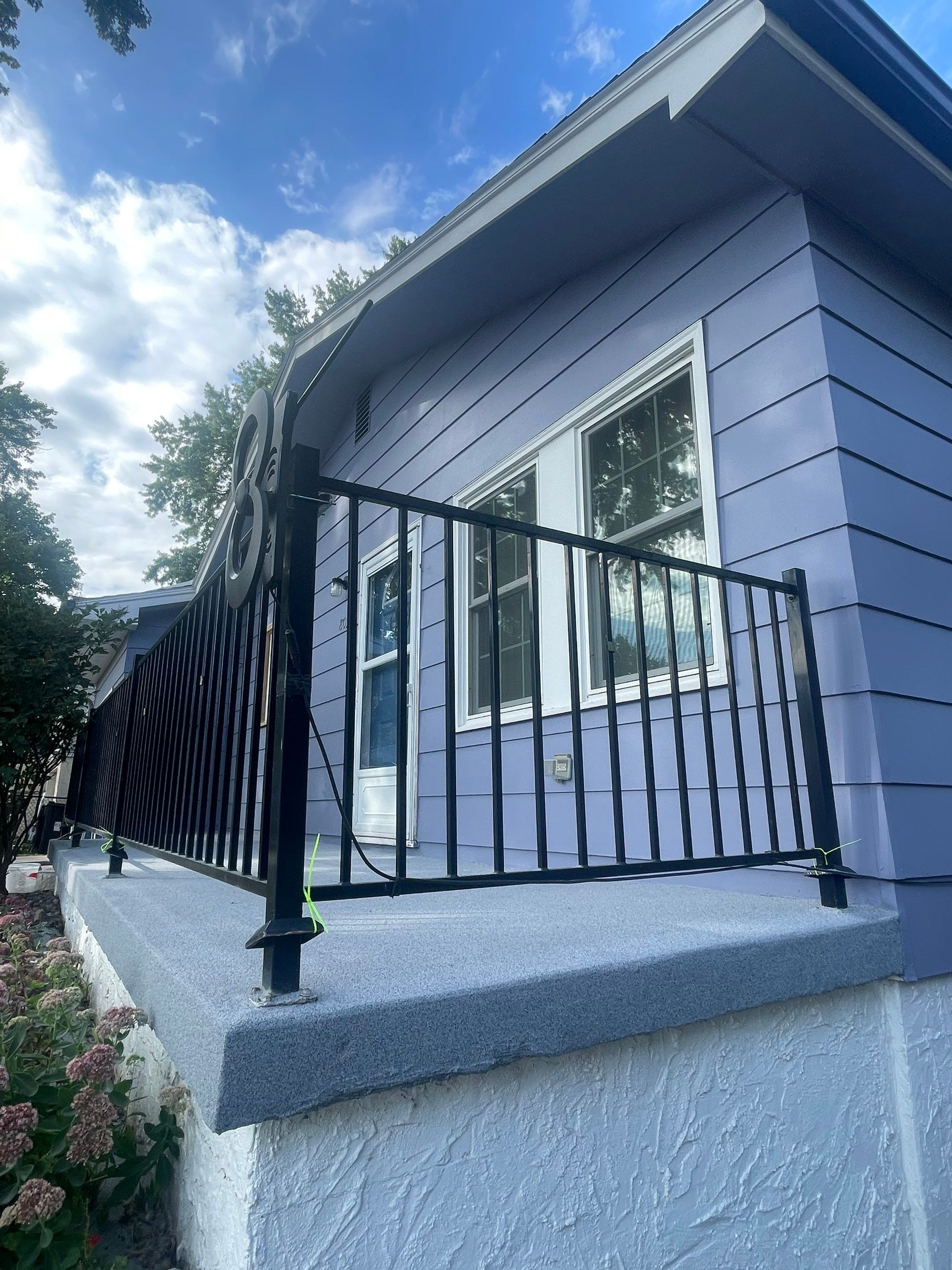 Sioux Falls Concrete Porch Coating with Starry Evening Finish by Select Painting, Coatings & Garage Cabinets