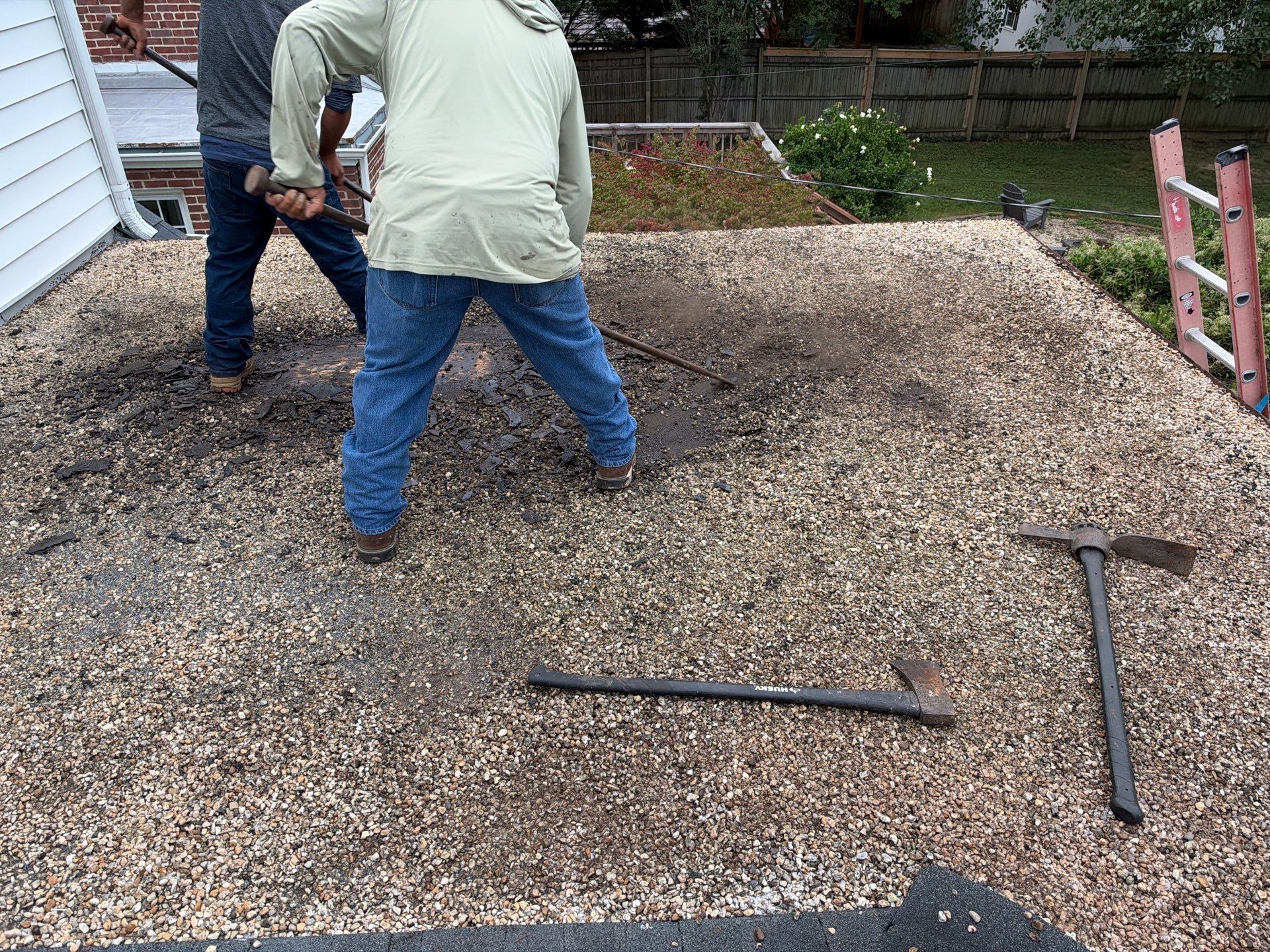 Richmond Roof Replacement Including Flat Membrane and Asphalt Shingles by Cade Construction