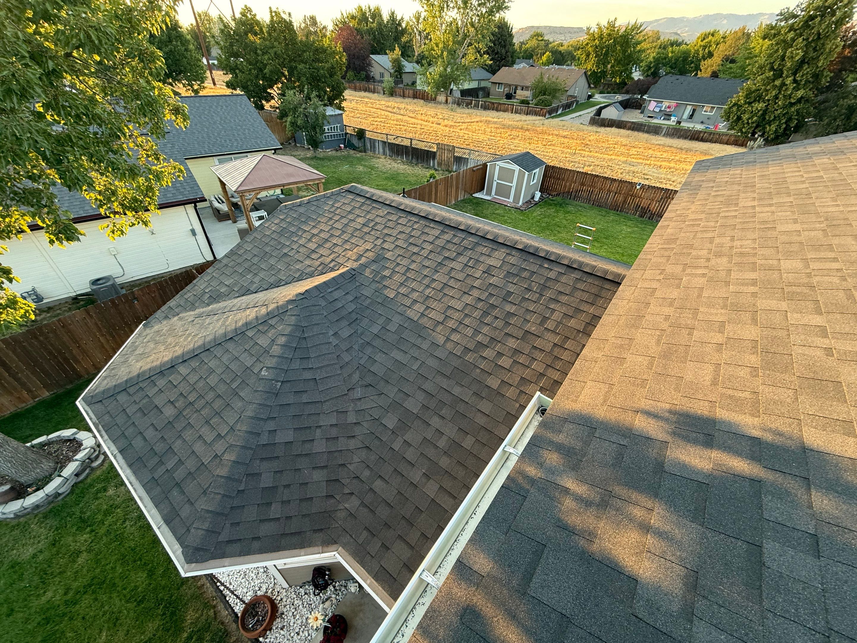 Residential Roof Replacement and Seamless Gutter Installation in Boise by Olive Roofing