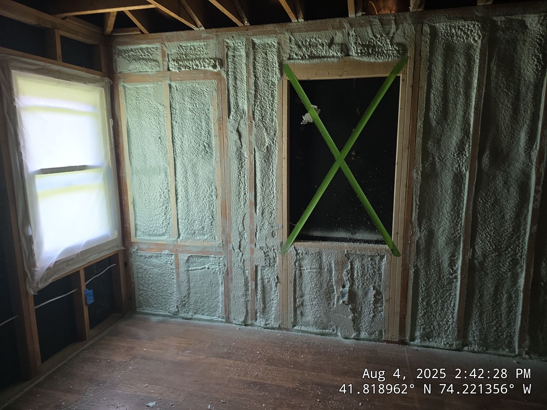 Master bedroom Exterior Walls using open cell spray foam by NYS Foam & Energy