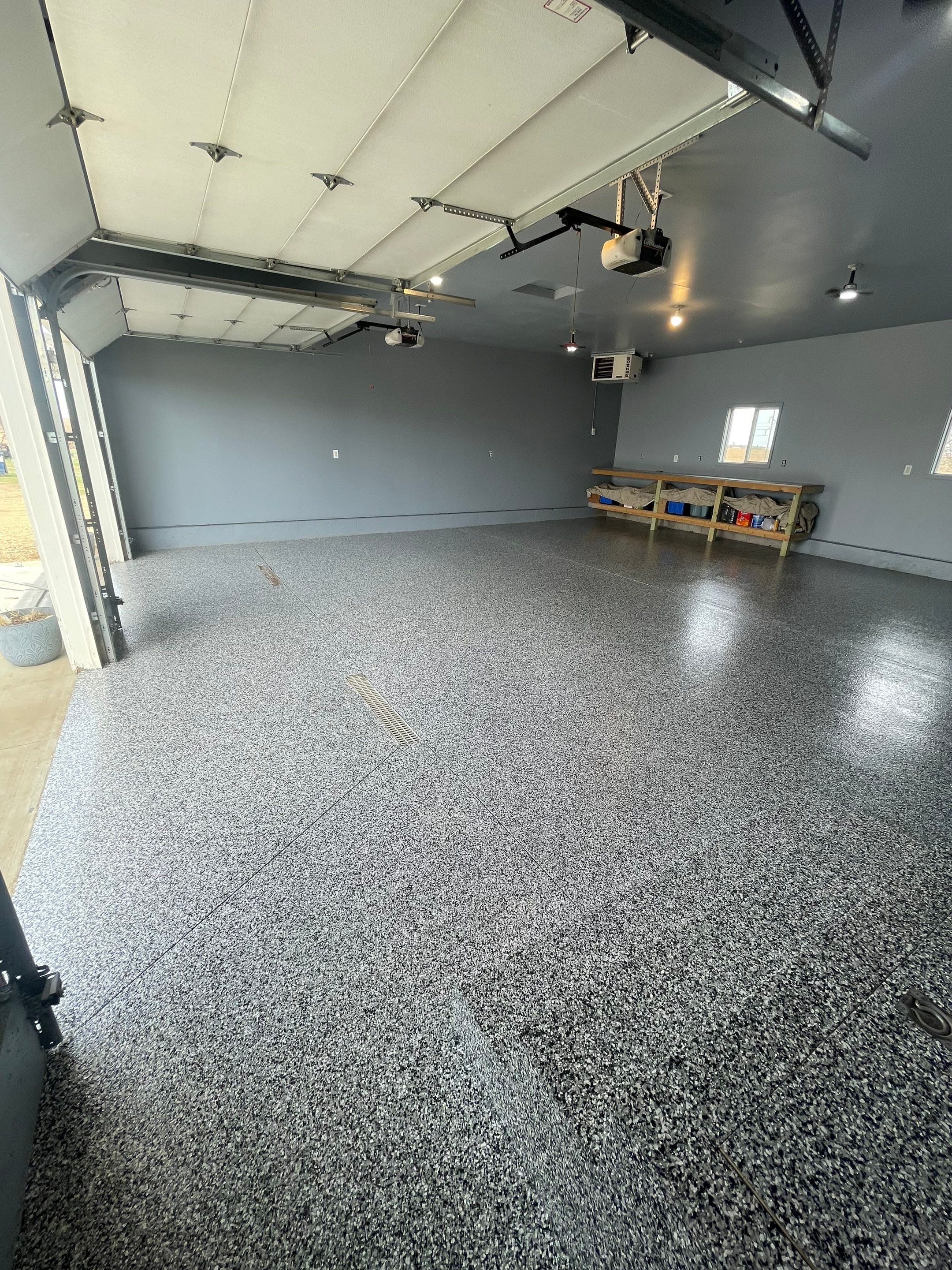 Grey Granite-Style Garage Floor Coating and Stairs in Hartford by Select Painting, Coatings & Garage Cabinets