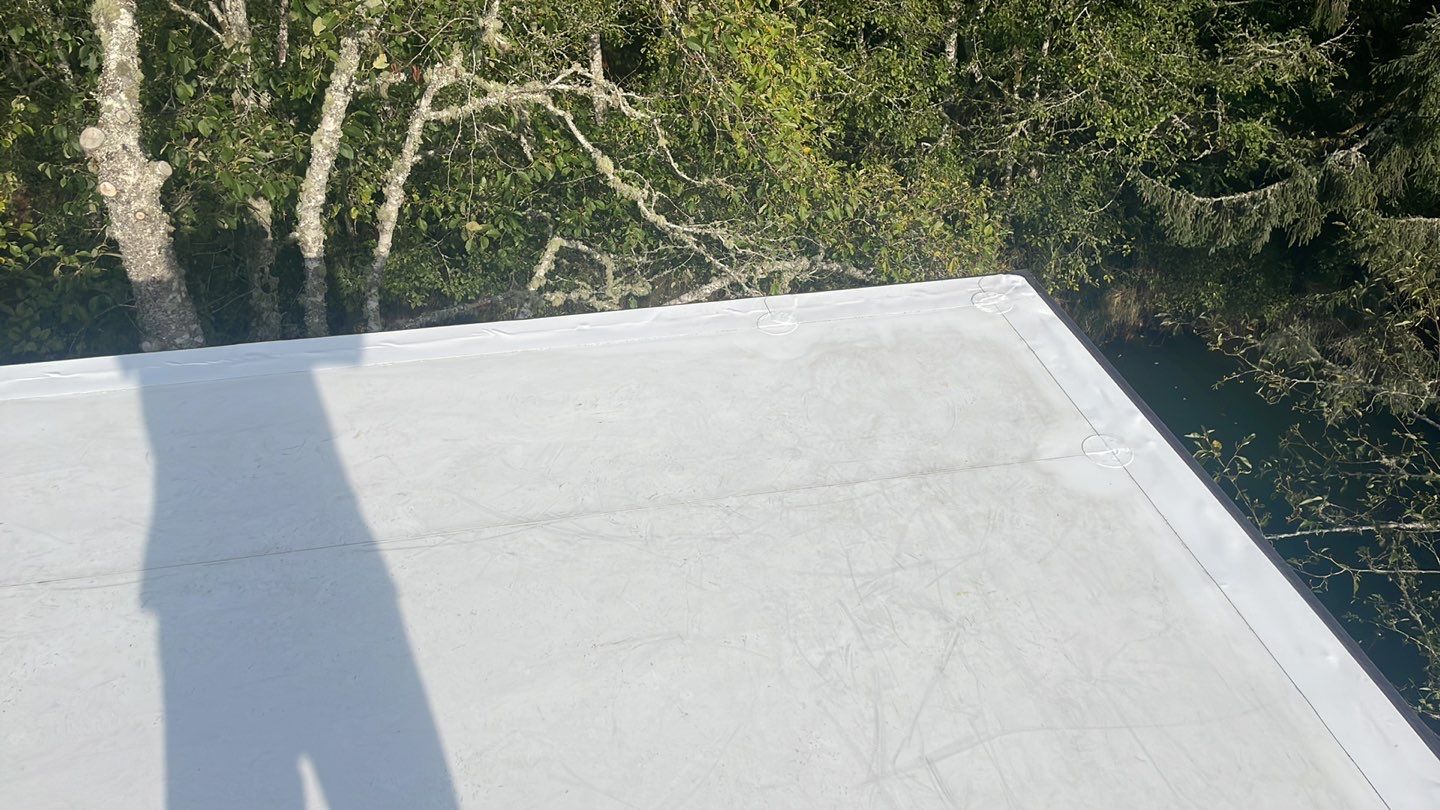 Commercial Roofing Installation using GAF 60Mil TPO  by Orezona Building & Roofing Company, Inc.