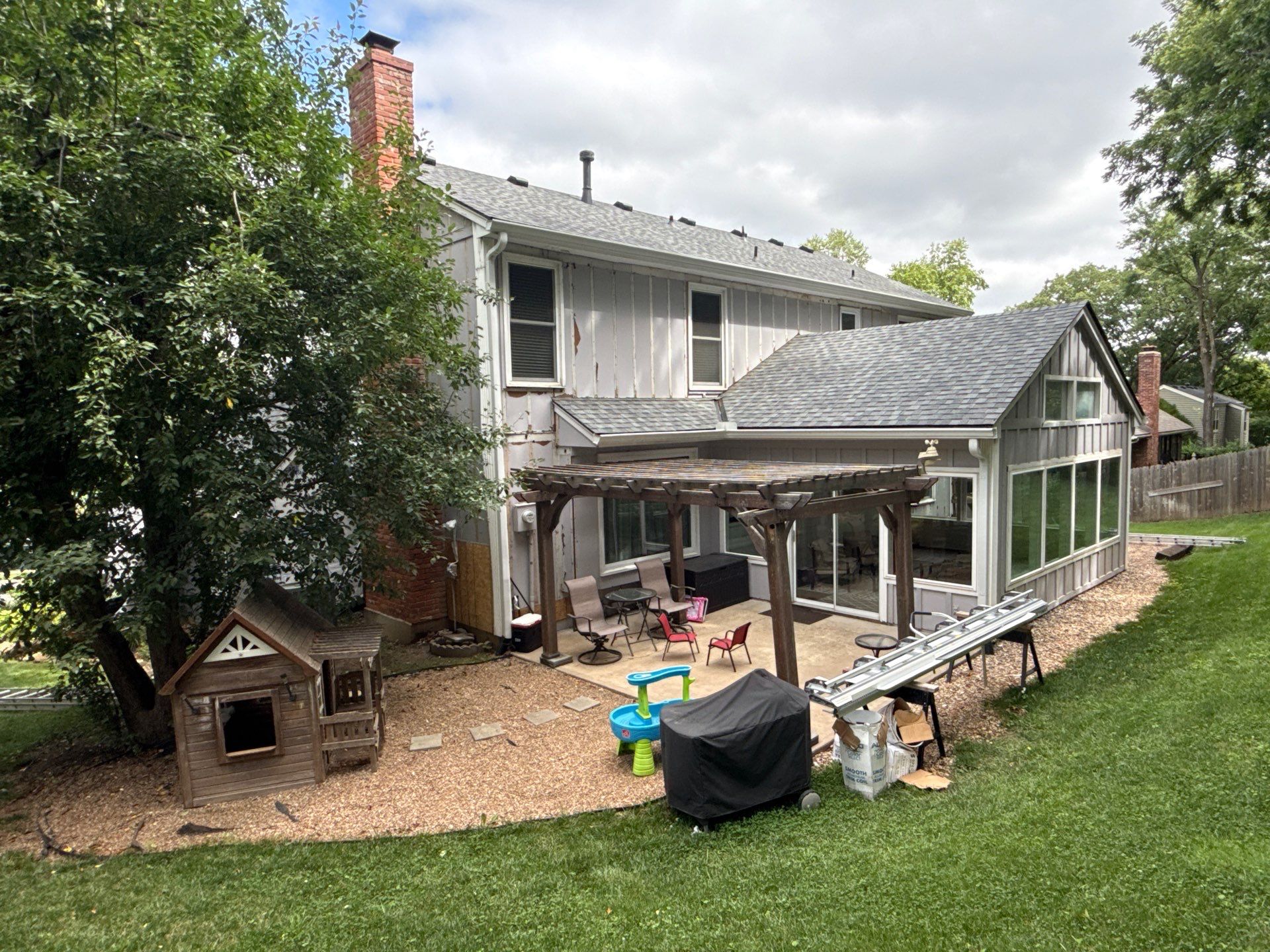 Full Exterior Siding Upgrade and Board and Batten Installation in Shawnee by EEC Windows, Siding & Roofing