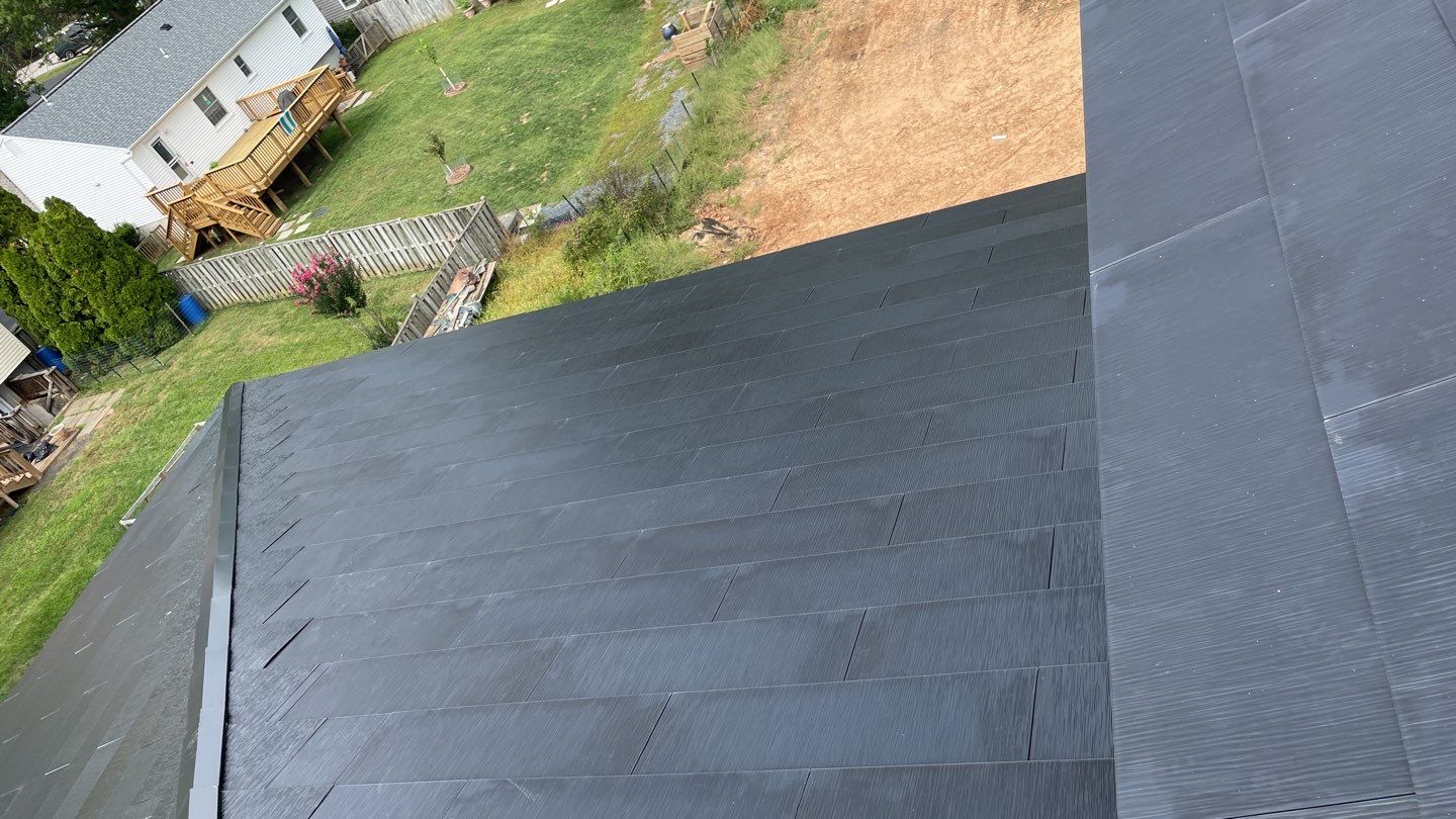 Tesla Solar Roof  using Tesla Solar Roof V3 tiles by American Home Contractors