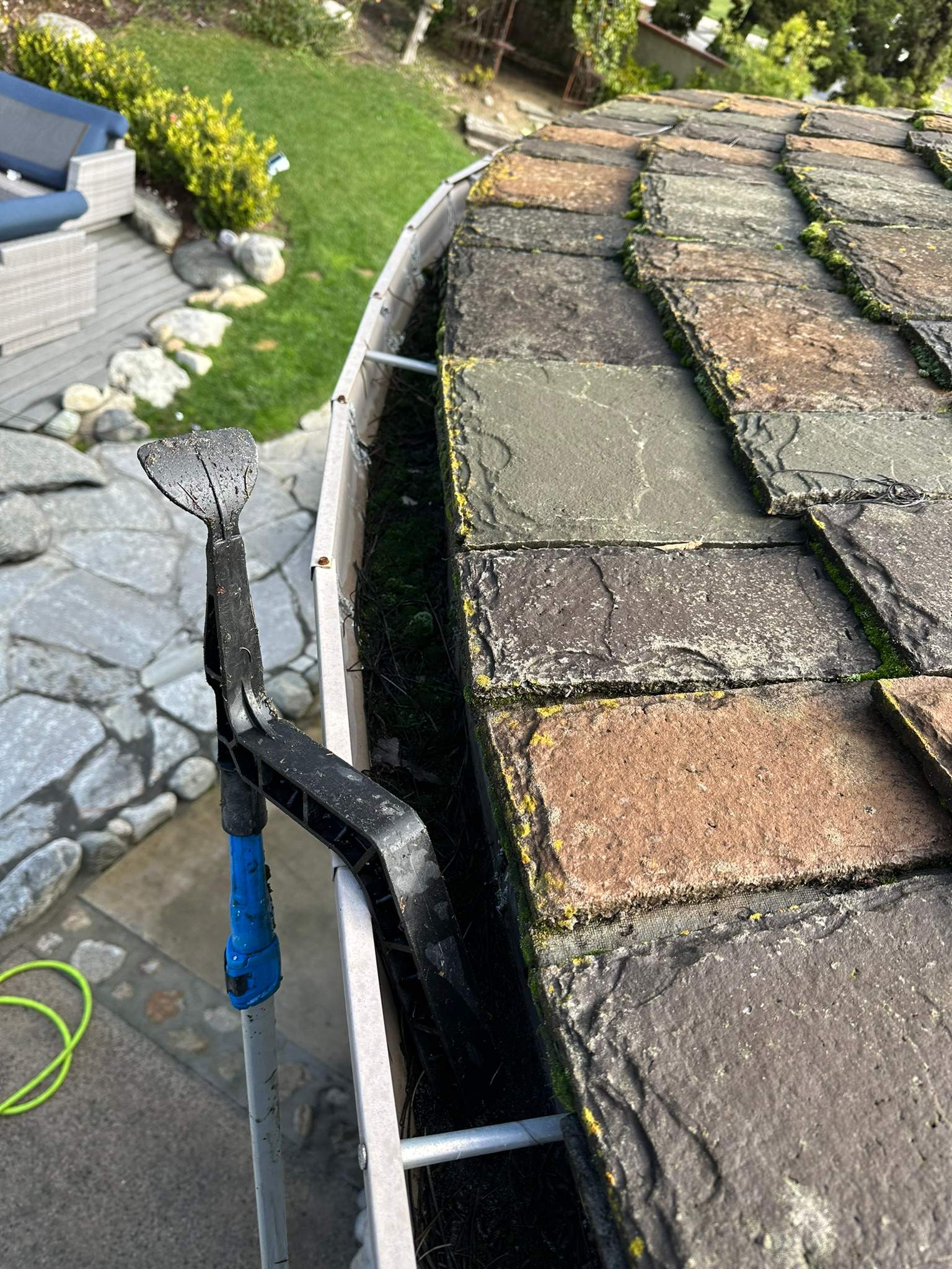 Orange County Gutter Cleaning in Wet Conditions by Property Cleaning Experts