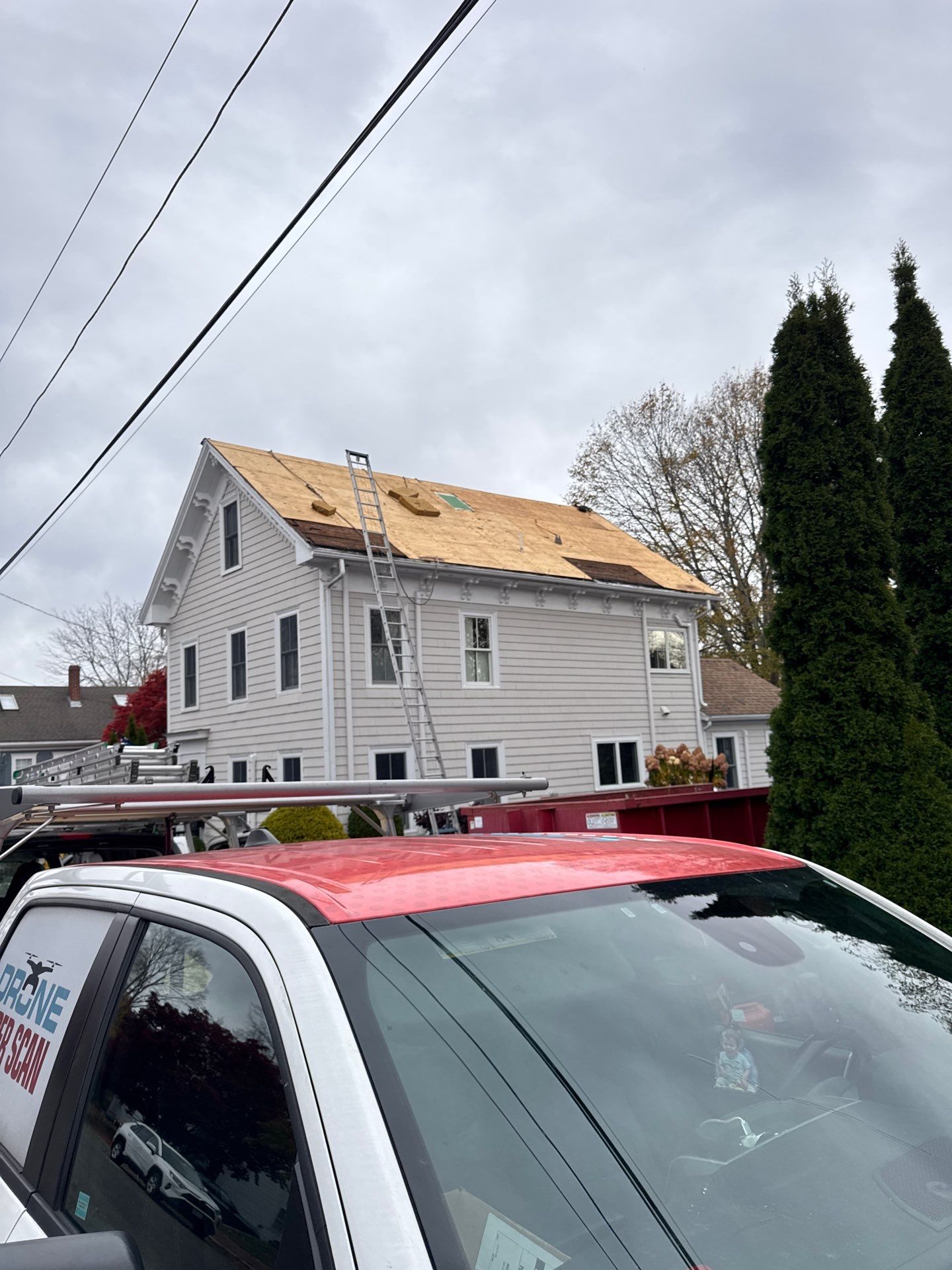 Newburyport Complete Roof Replacement with Solar Venting Skylight by Mighty Dog Roofing of Greater Middlesex County