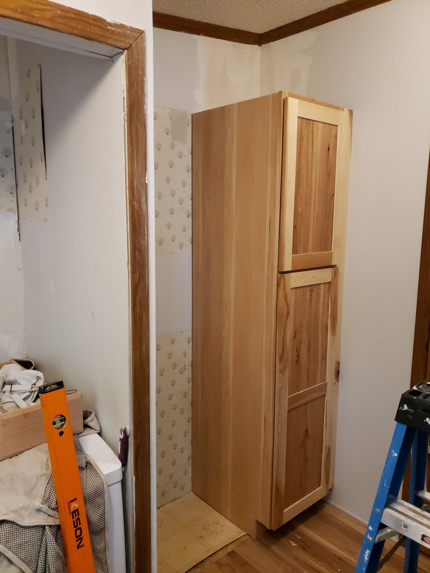 Stunning Kitchen Transformation with Raw Hickory Cabinets by A Step Above Handy LLC 