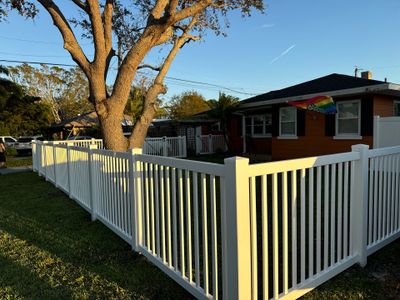 Vinyl Fence Installation using 6Ft White Vinyl Privacy Fence and a 4Ft White Vinyl Picket Fence