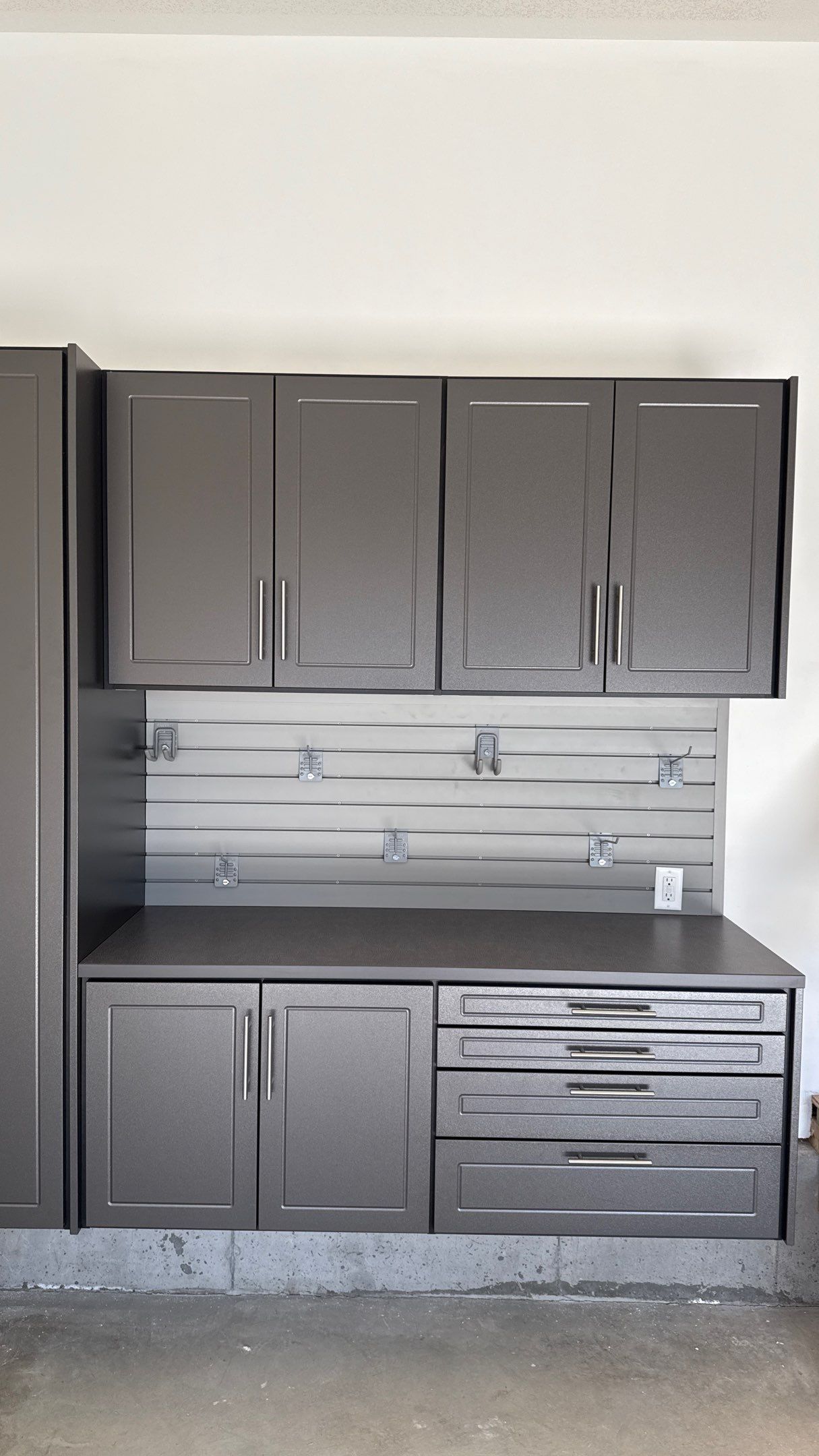 Nice Clean Look With These Pewter Cabinets by Banner Garage