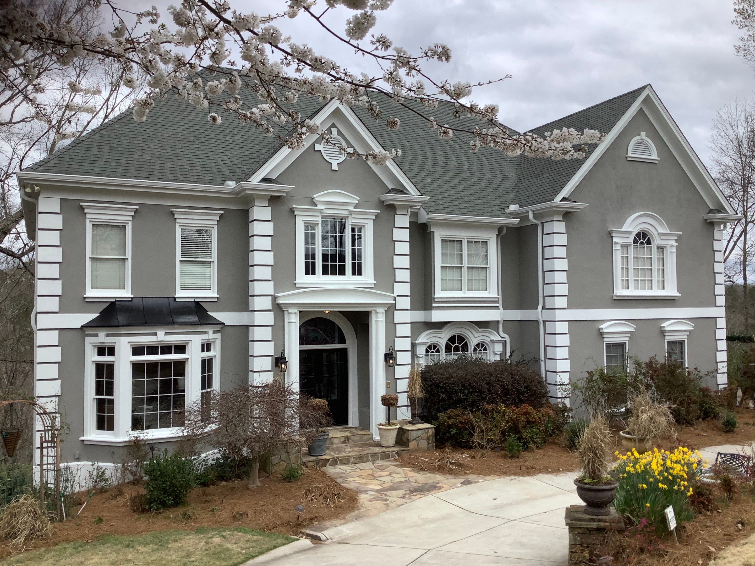 Exterior Stucco Painting and White Trim Update in Roswell by Swift Home Renovations