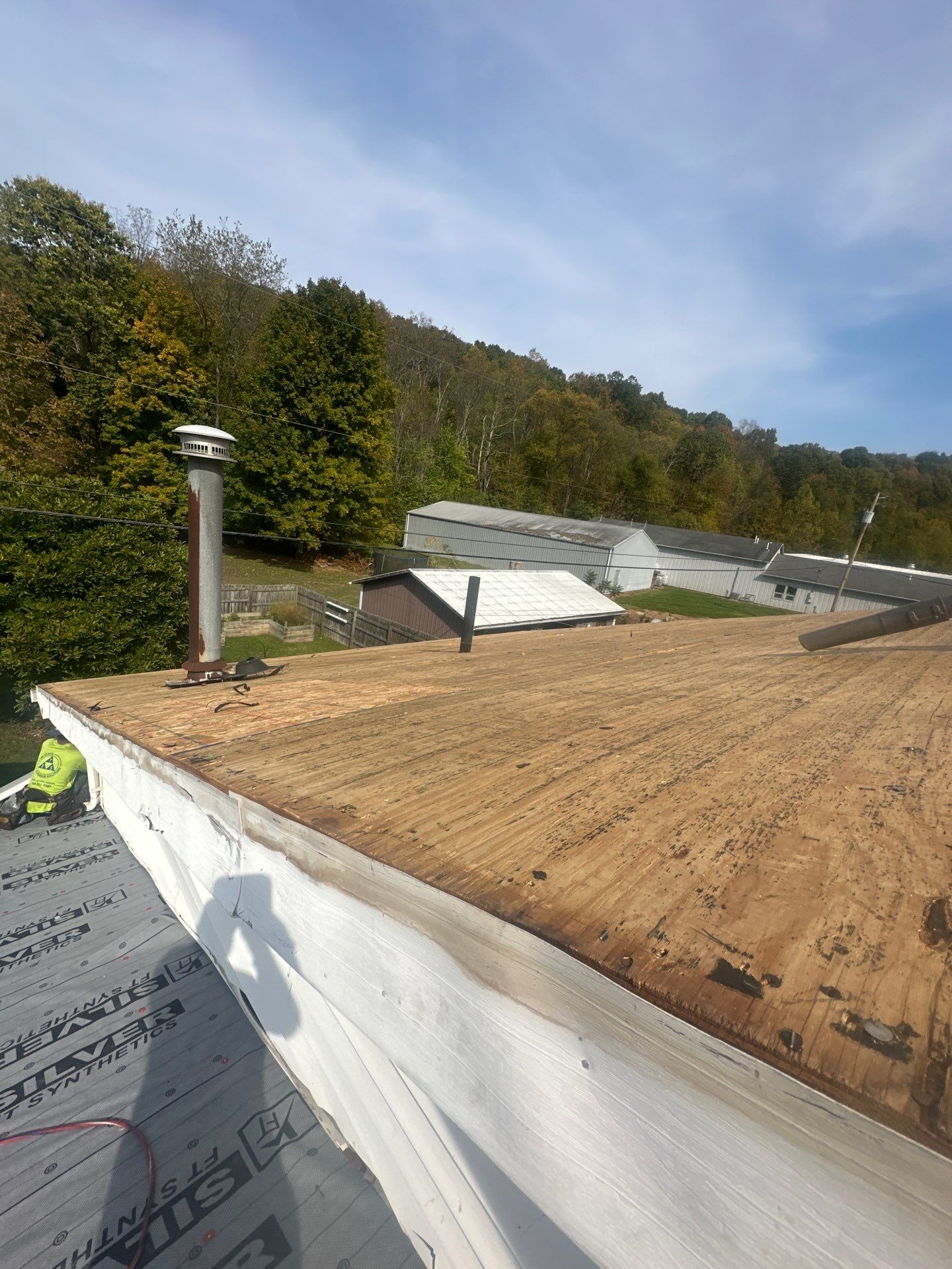 Residential Roofing Installation using Metal by Rainstoppers Roofing