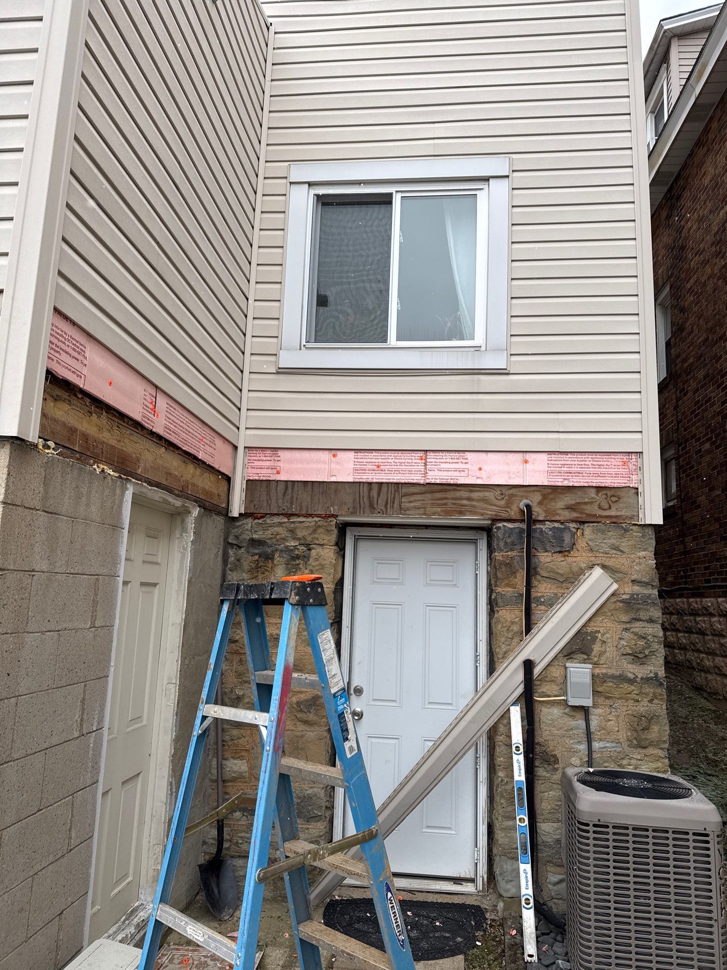 Deck and door by Cousins Roofing Siding & Decks