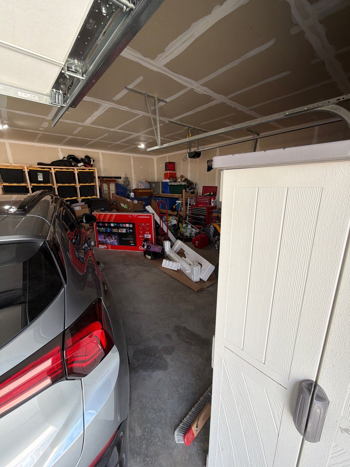 Epoxy Garage Floor Coating with Decorative Flake in Harrisburg by Select Painting, Coatings & Garage Cabinets