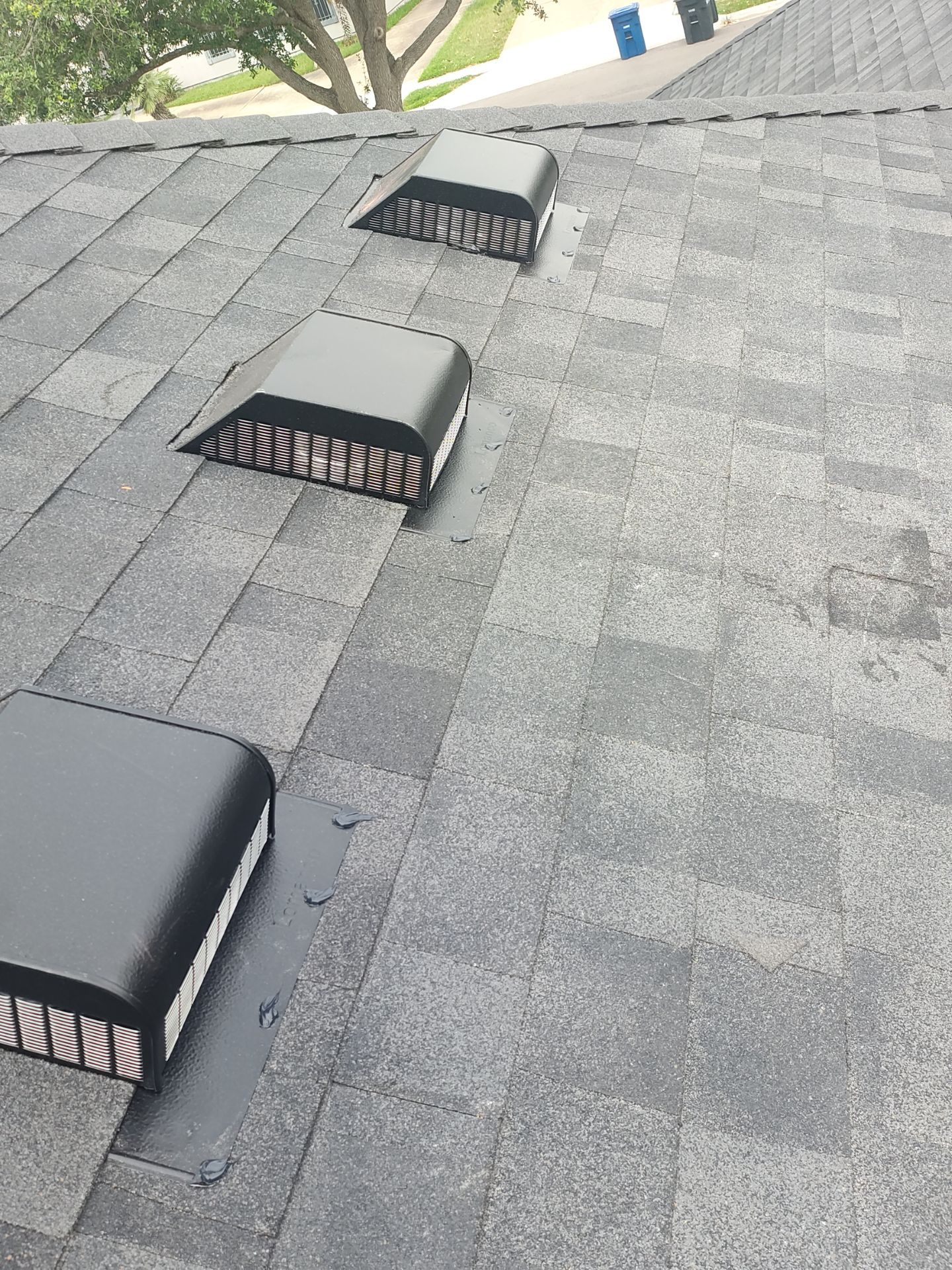 Nothing looks nicer than a little black roof by Bayfront Roofing and Construction