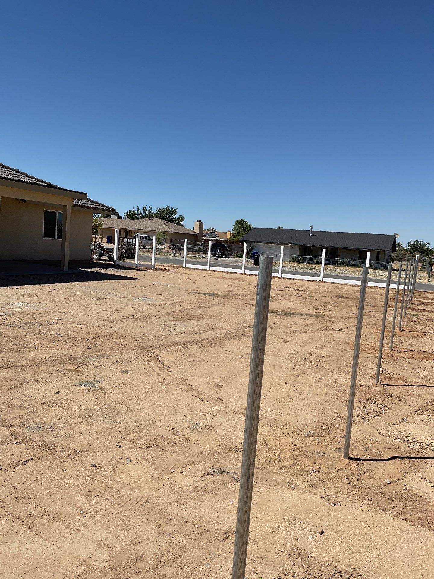 6ft White Privacy Vinyl Fence with Chain-link Fence by Fence Guys Inc.