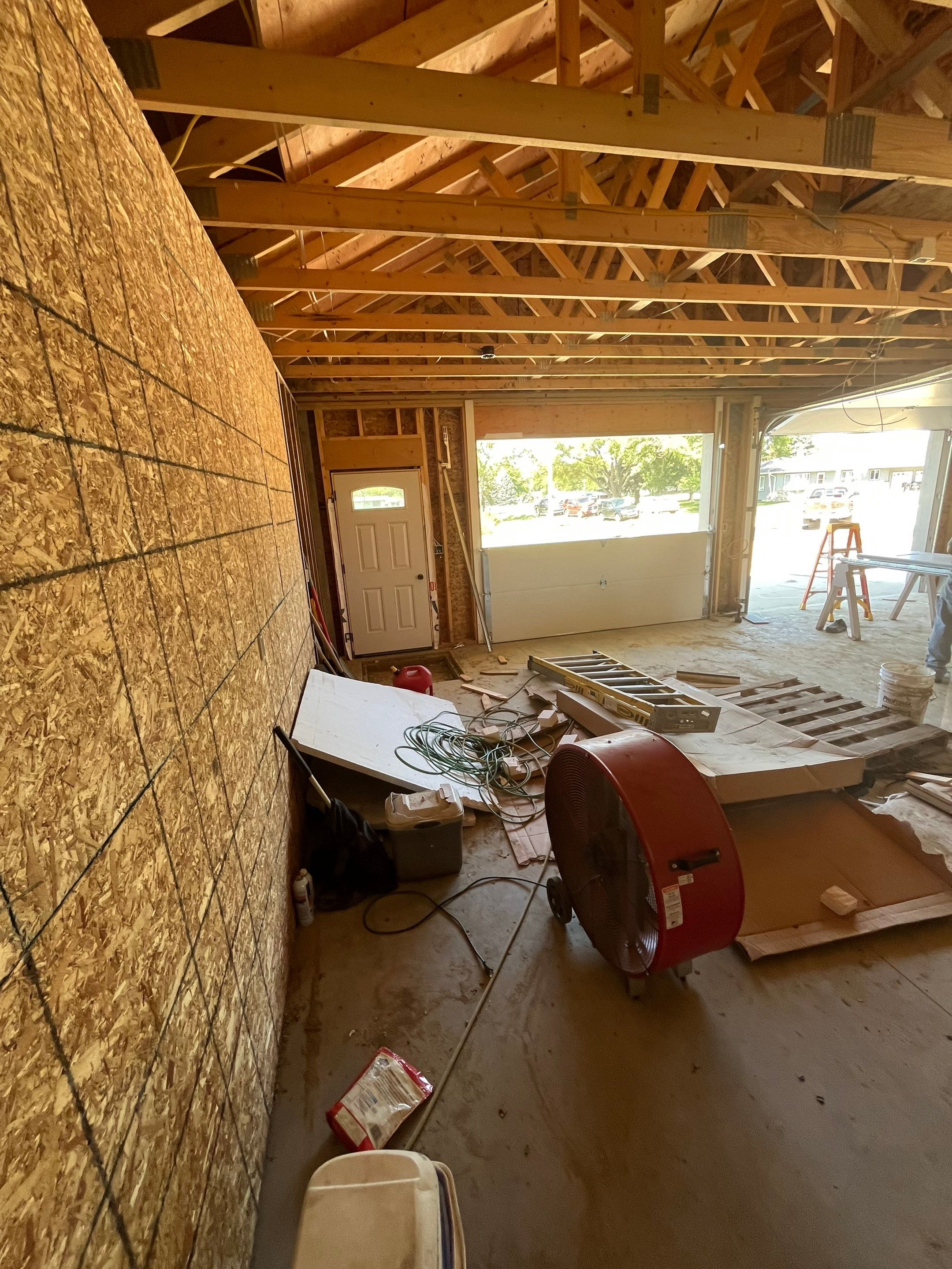 Custom Garage and Basement Epoxy Floor Coating in Menno by Select Painting, Coatings & Garage Cabinets