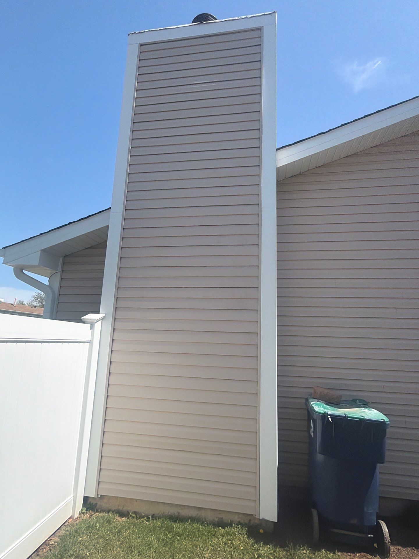 Chimney siding replacement by Optimal Home Improvement