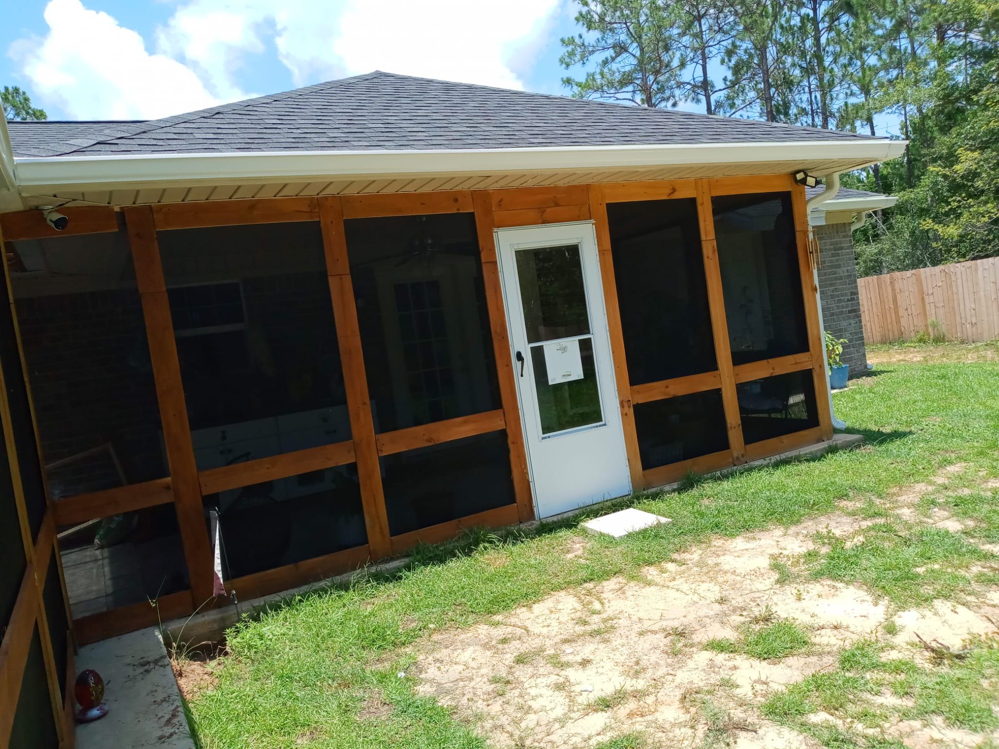 Downspout Installation using White Down Spouts in Milton FL by Gutter Professors