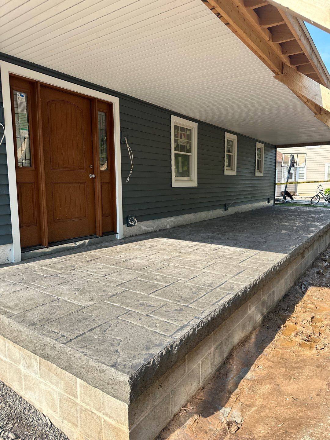 Stamped English Rivenstone concrete Porch/Patio  by NG Masonry & Construction LLC