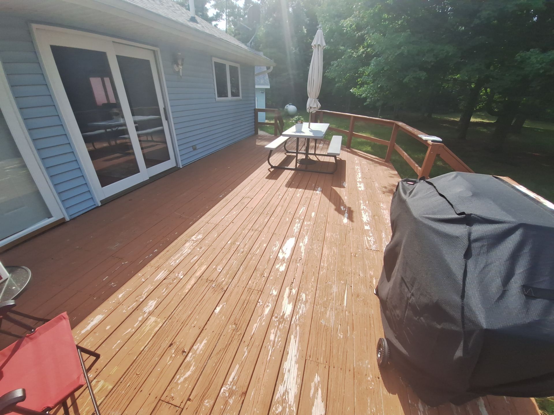 Deck staining and exterior foundation painting! by Gordon Painting