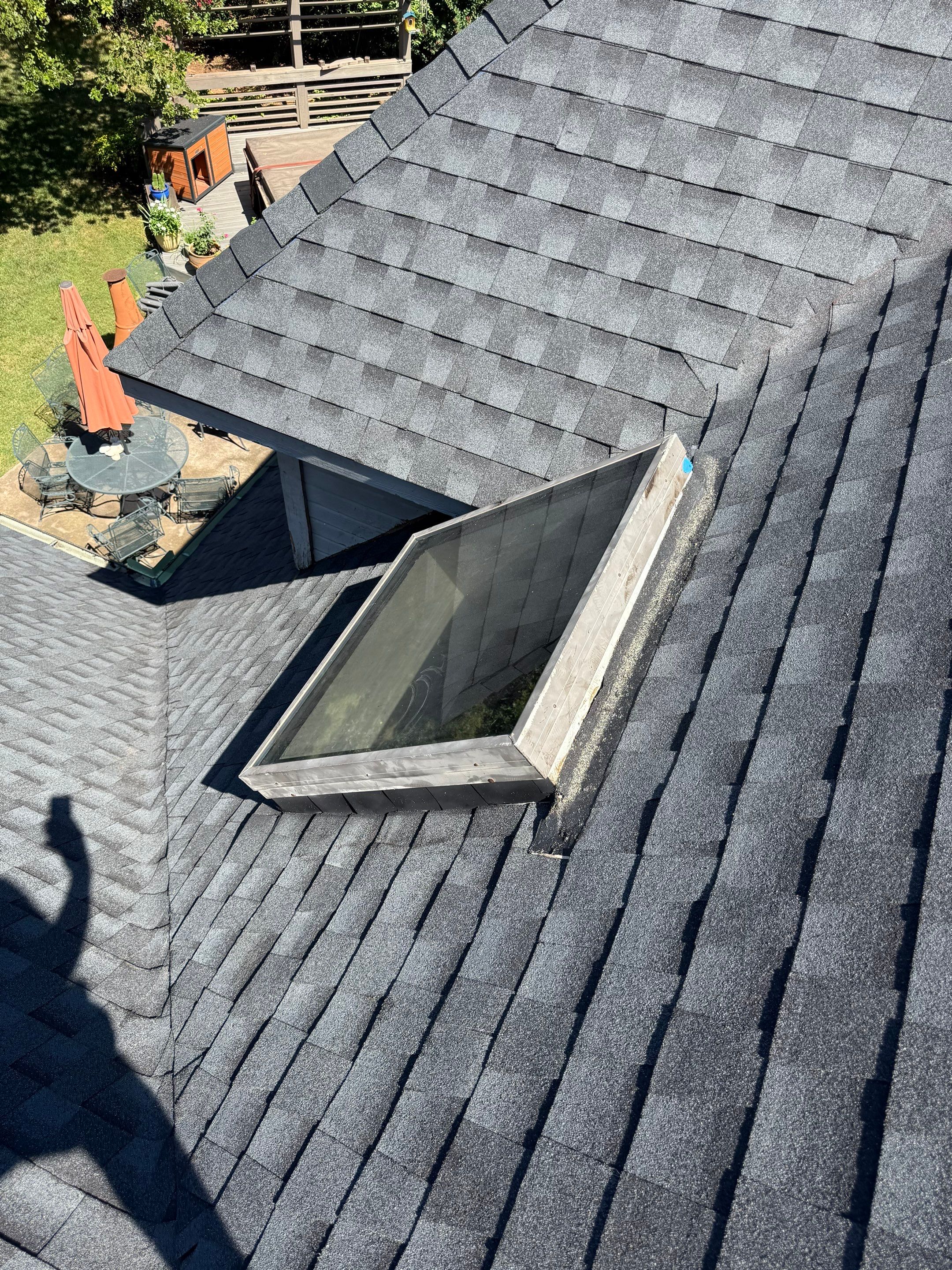roof replacement & skylight repair in Edmond by McCann's Roofing and Construction