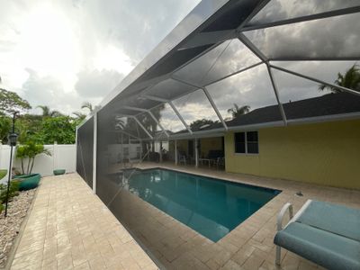 Custom White Pool Enclosure Installation