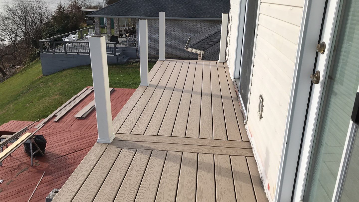 Deck Refurbush and Door Replacement using Trex Decking and Railing. Polaris Patio Doors by Secure Construction Company Inc