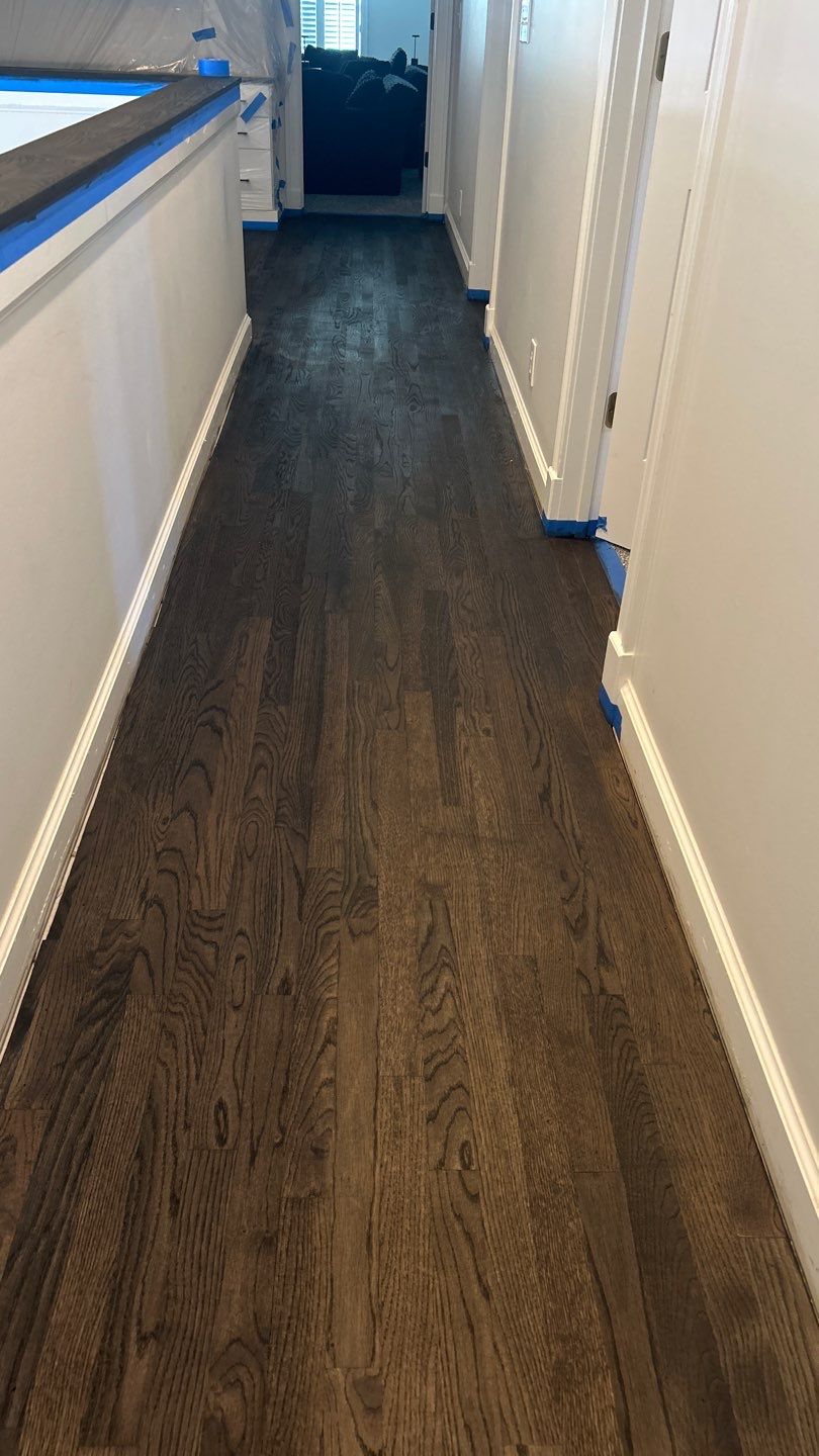 Updated staircase and hallway by Footprints Floors of Nashville
