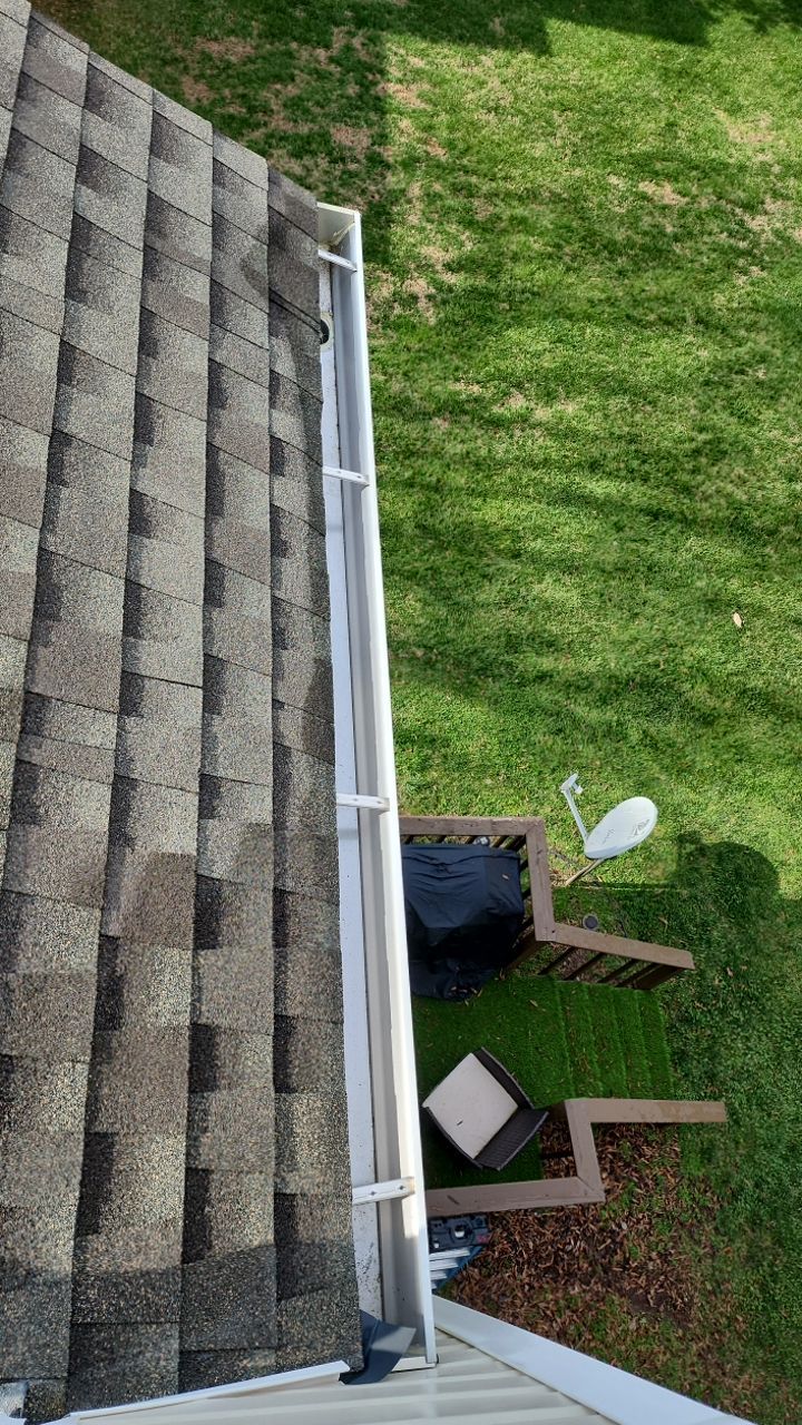Gutter Cleaning using water by Power Wash Masters LLC