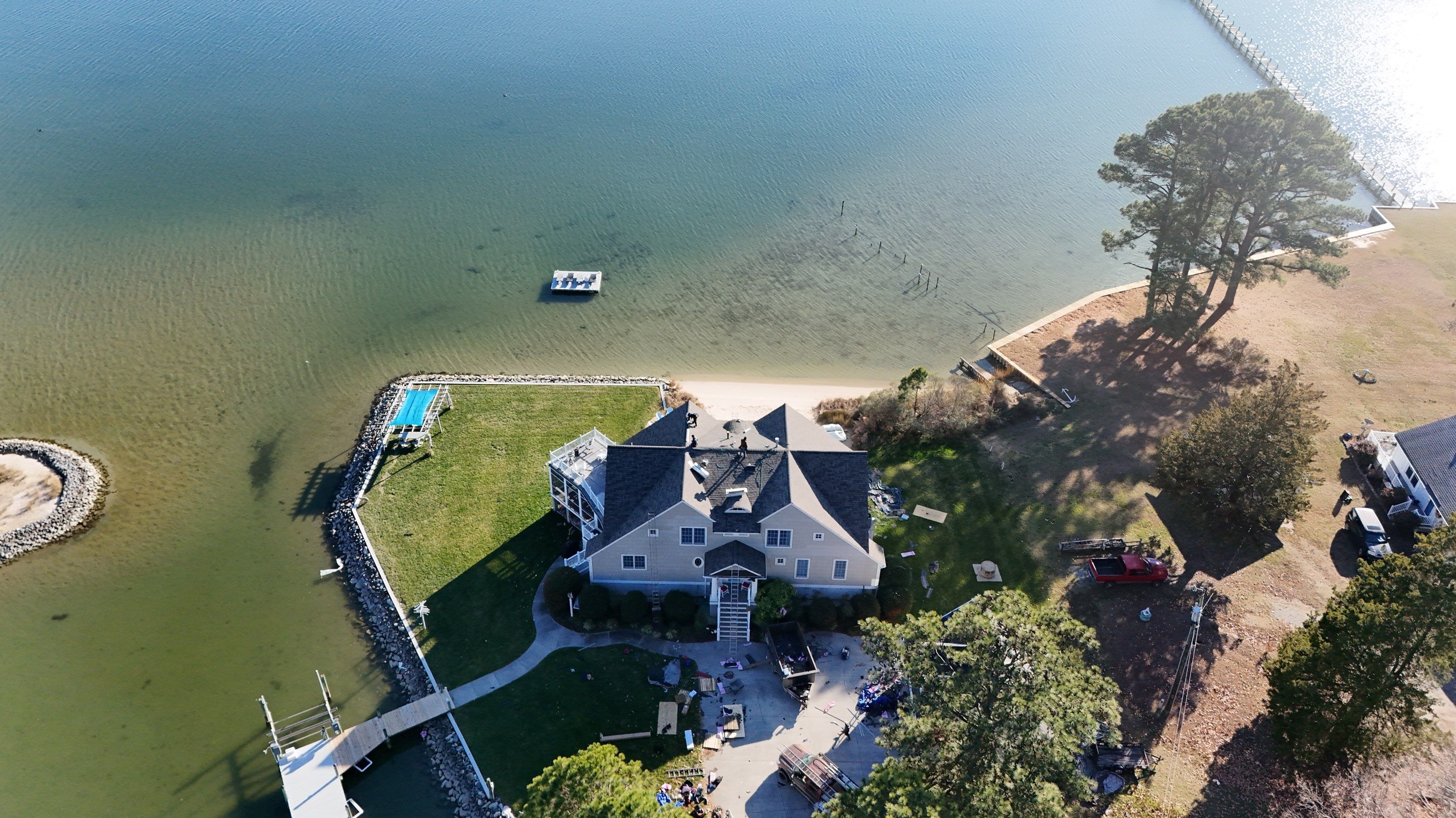 Waterfront Roof Replacement in White Stone, VA by Cade Construction