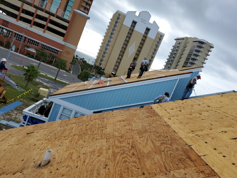 Commercial Roofing Installation using Metal roofing by American Roofing & Construction LLC