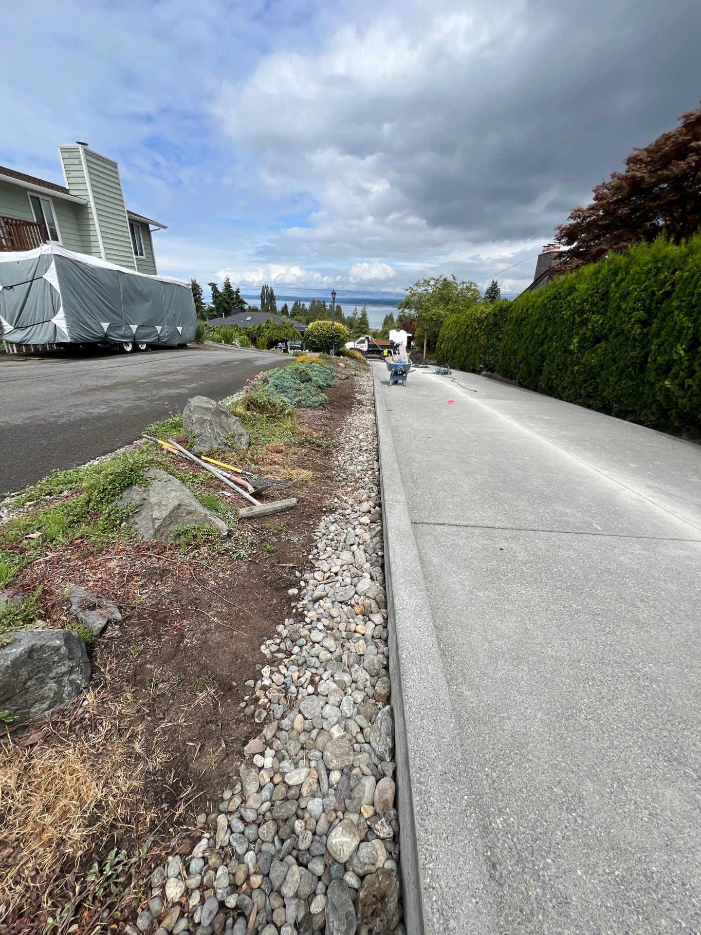 Concrete Driveway Makeover w/ Asphalt Patch | Everett  by Jireh Asphalt & Concrete Inc 