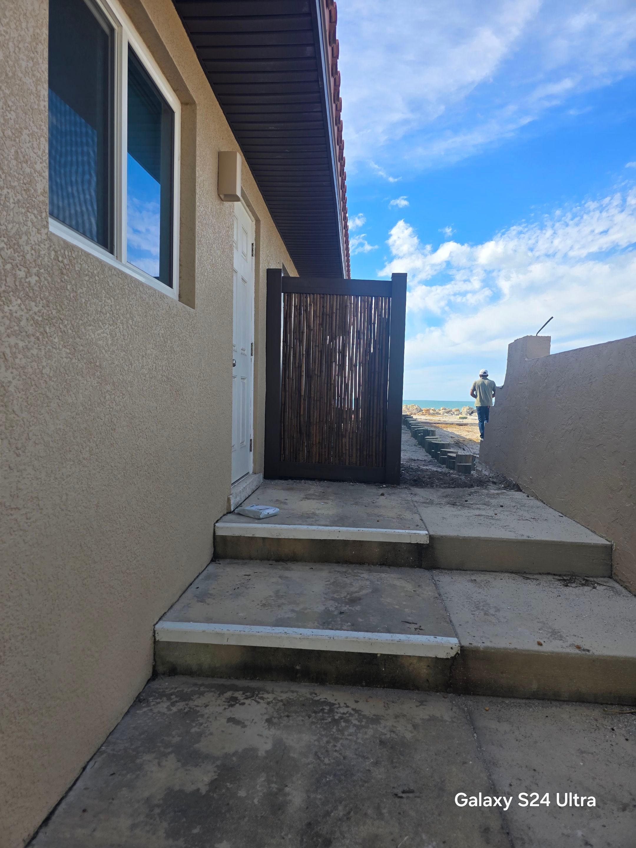 Custom Bamboo Vinyl Fence in Manasota Key by True Fence LLC